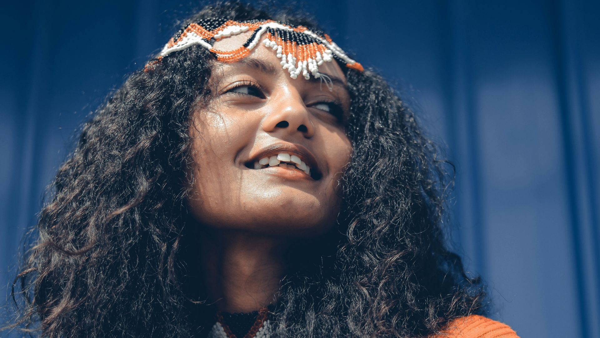 woman in orange button up shirt