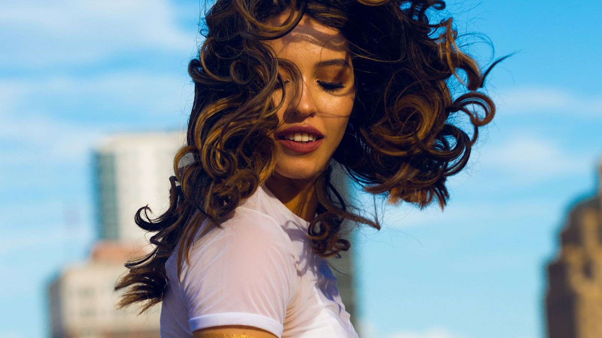 woman wearing white shirt standing