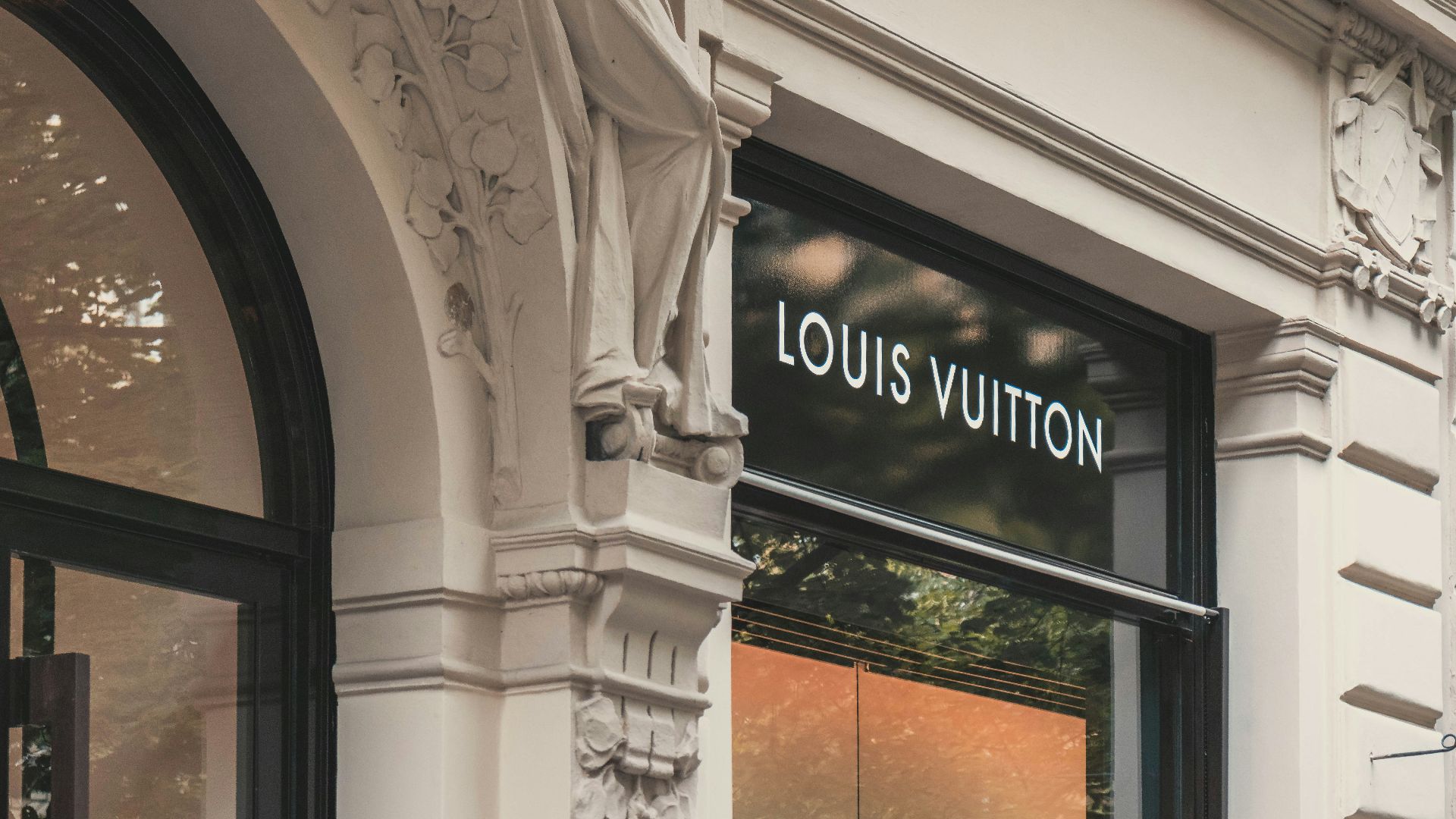 Louis Vuitton boutique signage on building