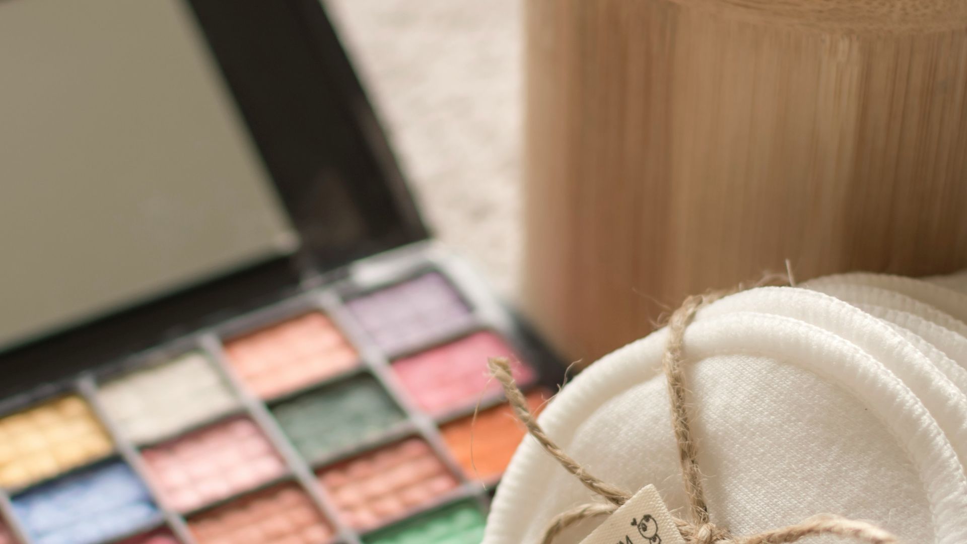 white yarn on brown wooden round container