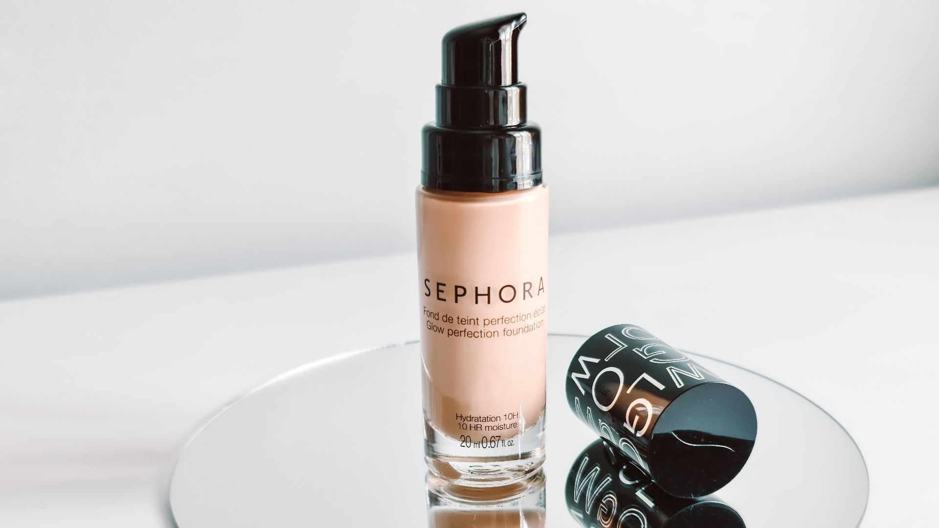 white and black spray bottle