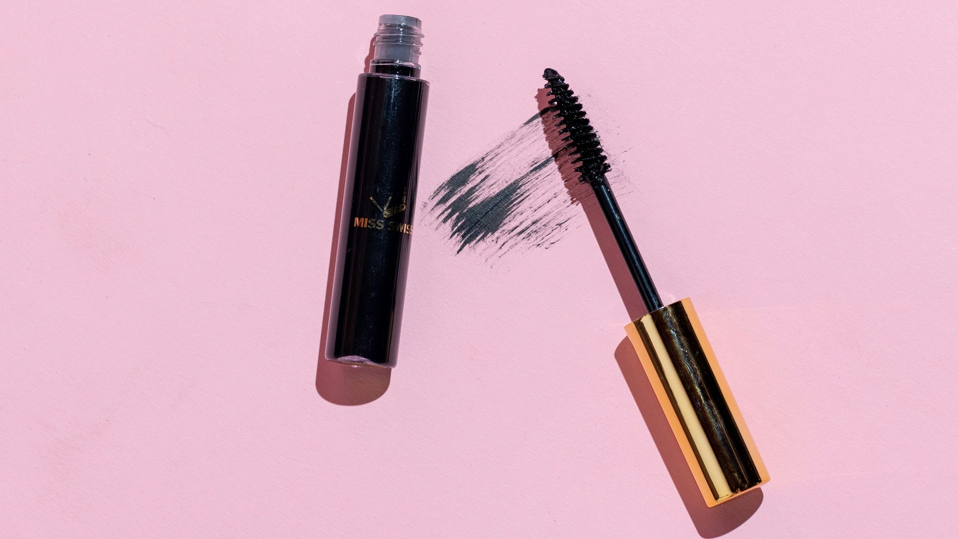 silver and black makeup brush