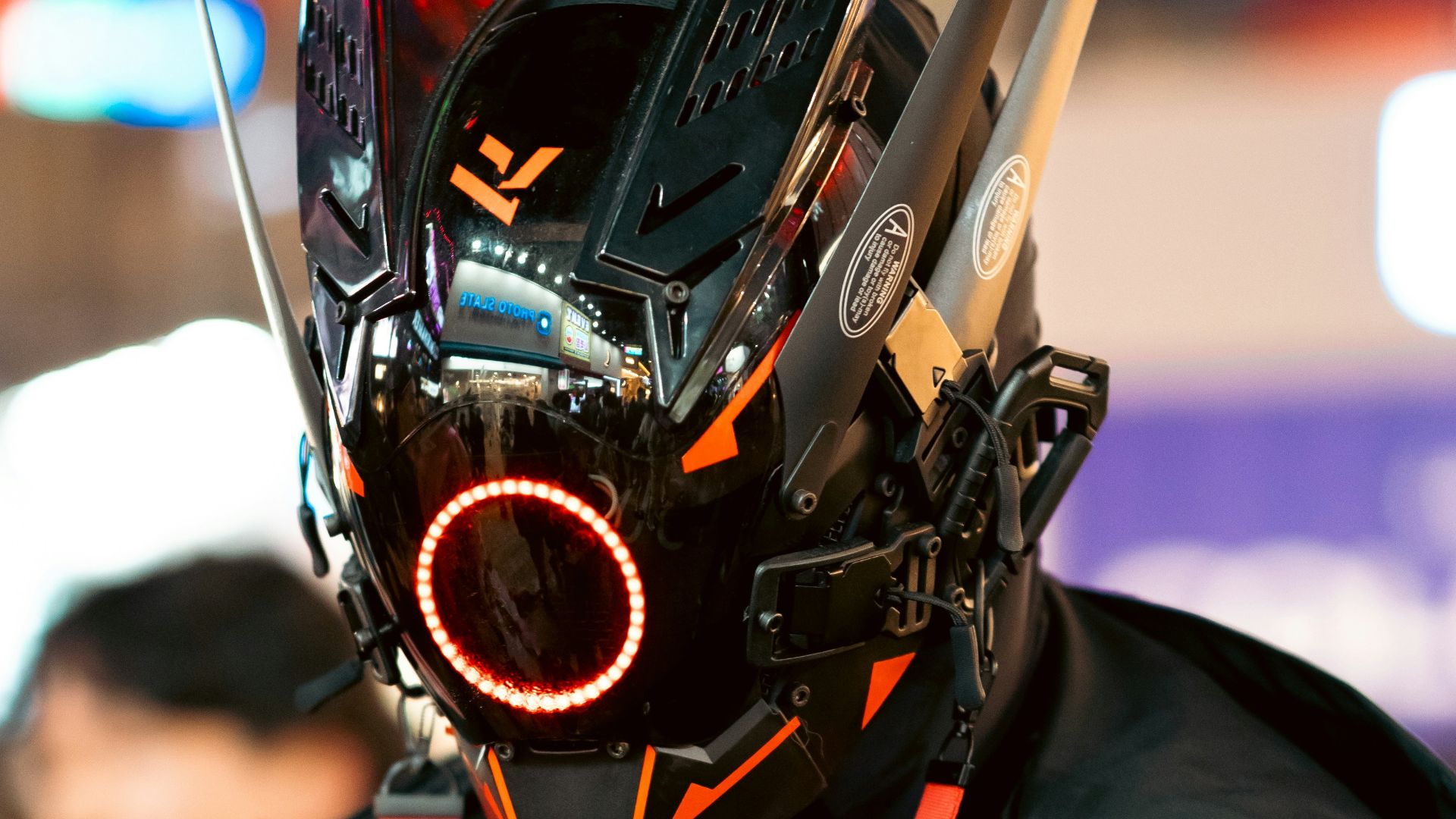 a man wearing a mask with electronic gadgets attached to it