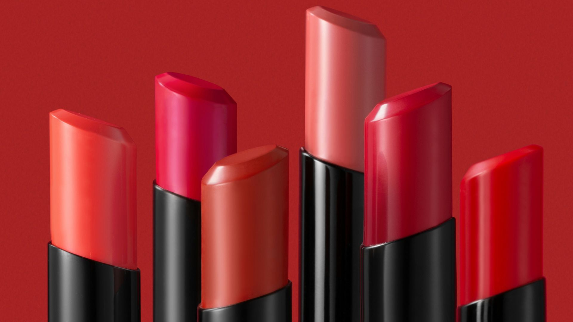 a group of lipsticks sitting next to each other