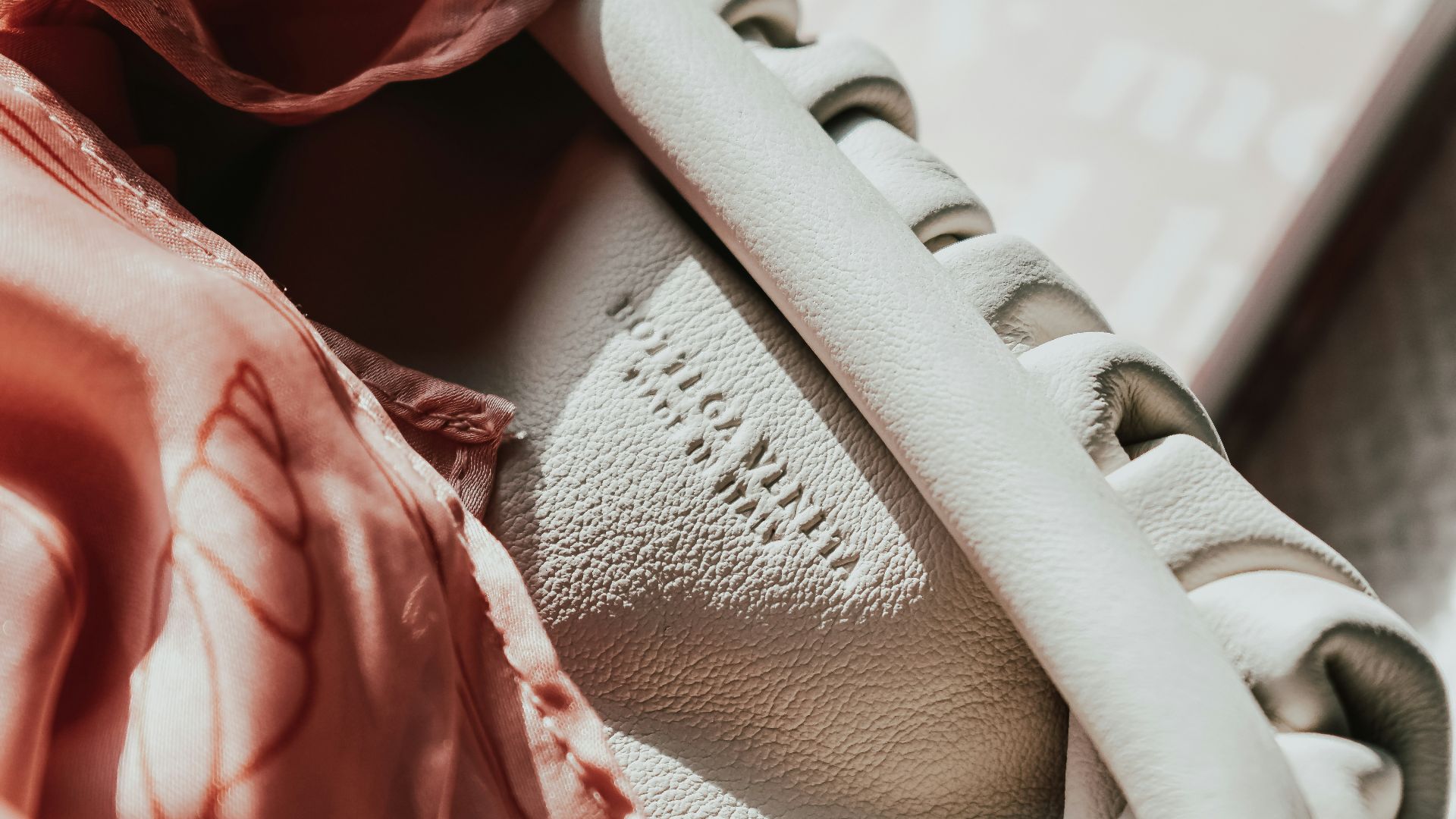 a close up of a pair of white shoes