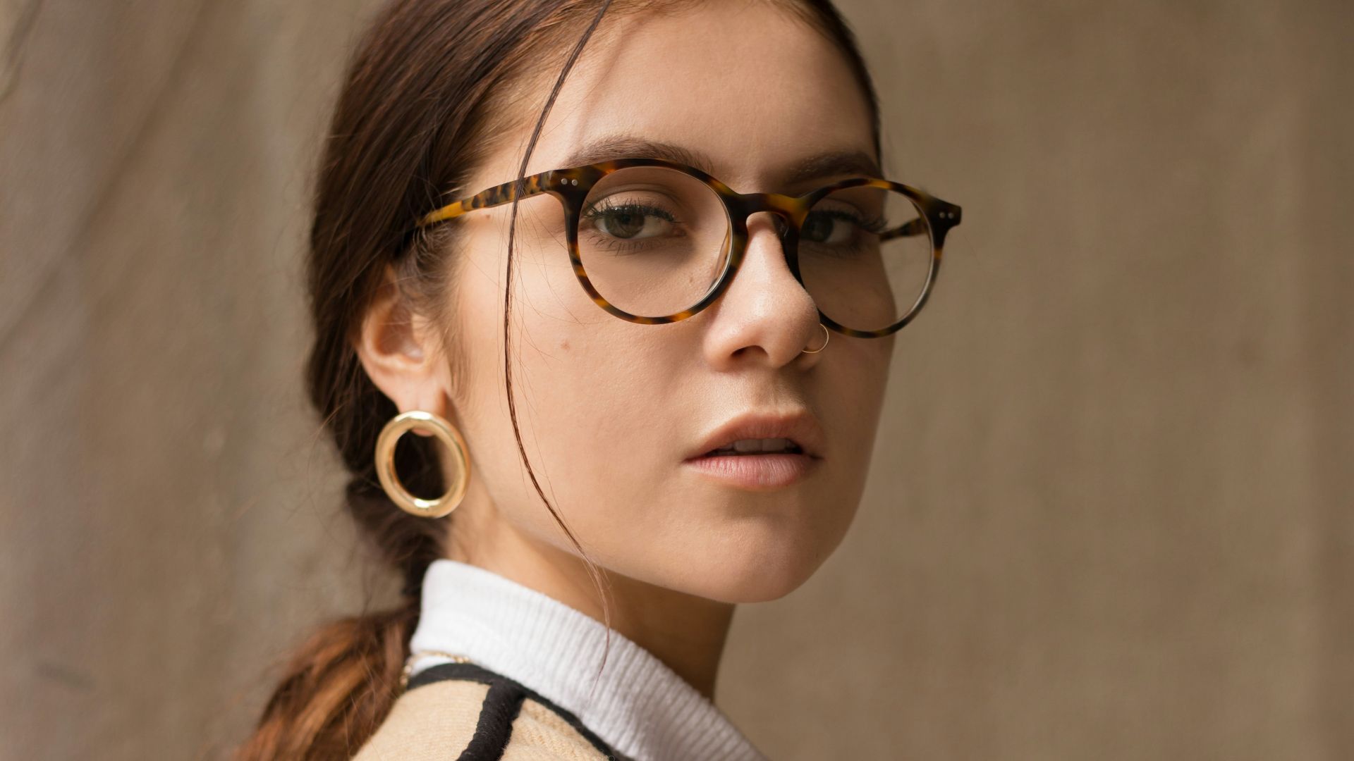 woman wearing brown and black coat