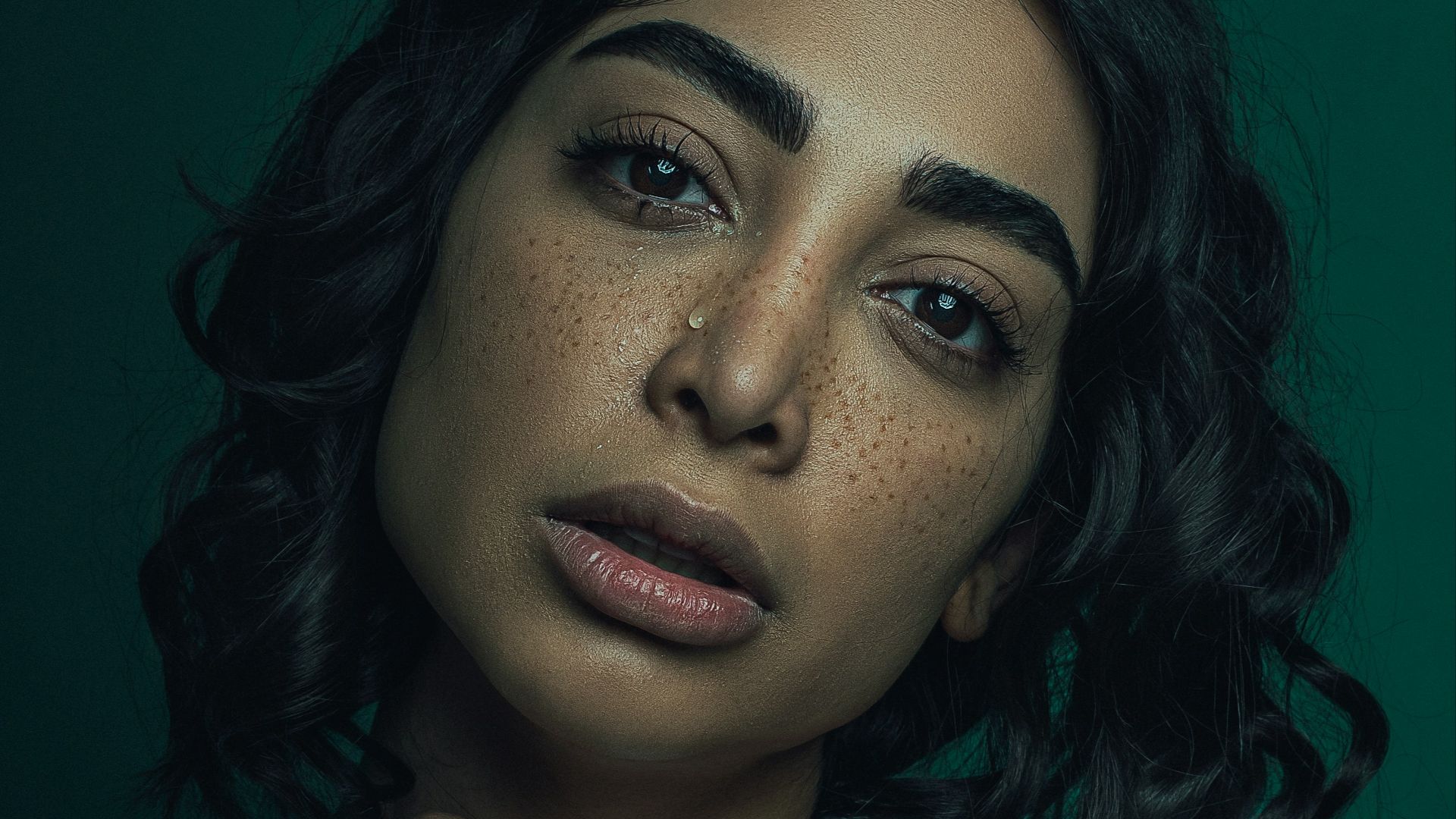 woman in white shirt with blue eyes