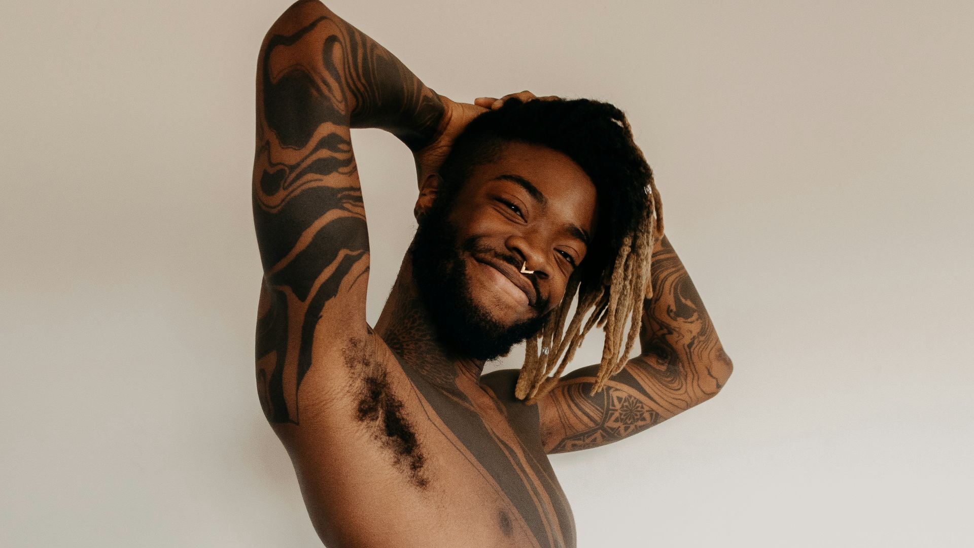 man in black and brown long sleeve shirt