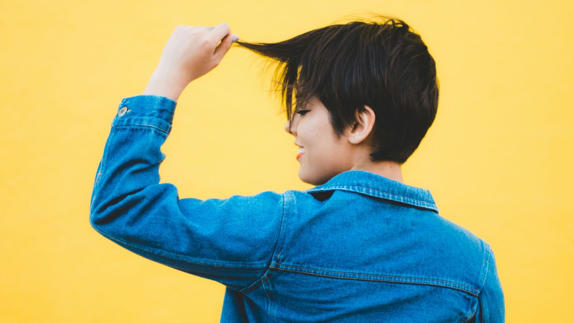 women wearing blue denim jacket