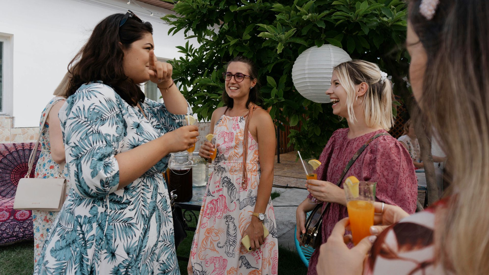 a group of women standing next to each other