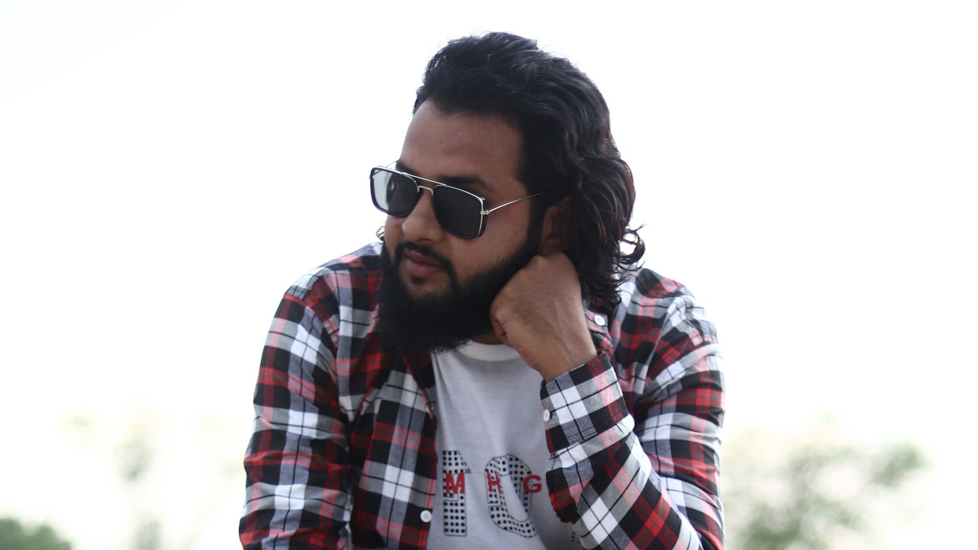 a man sitting on a rock