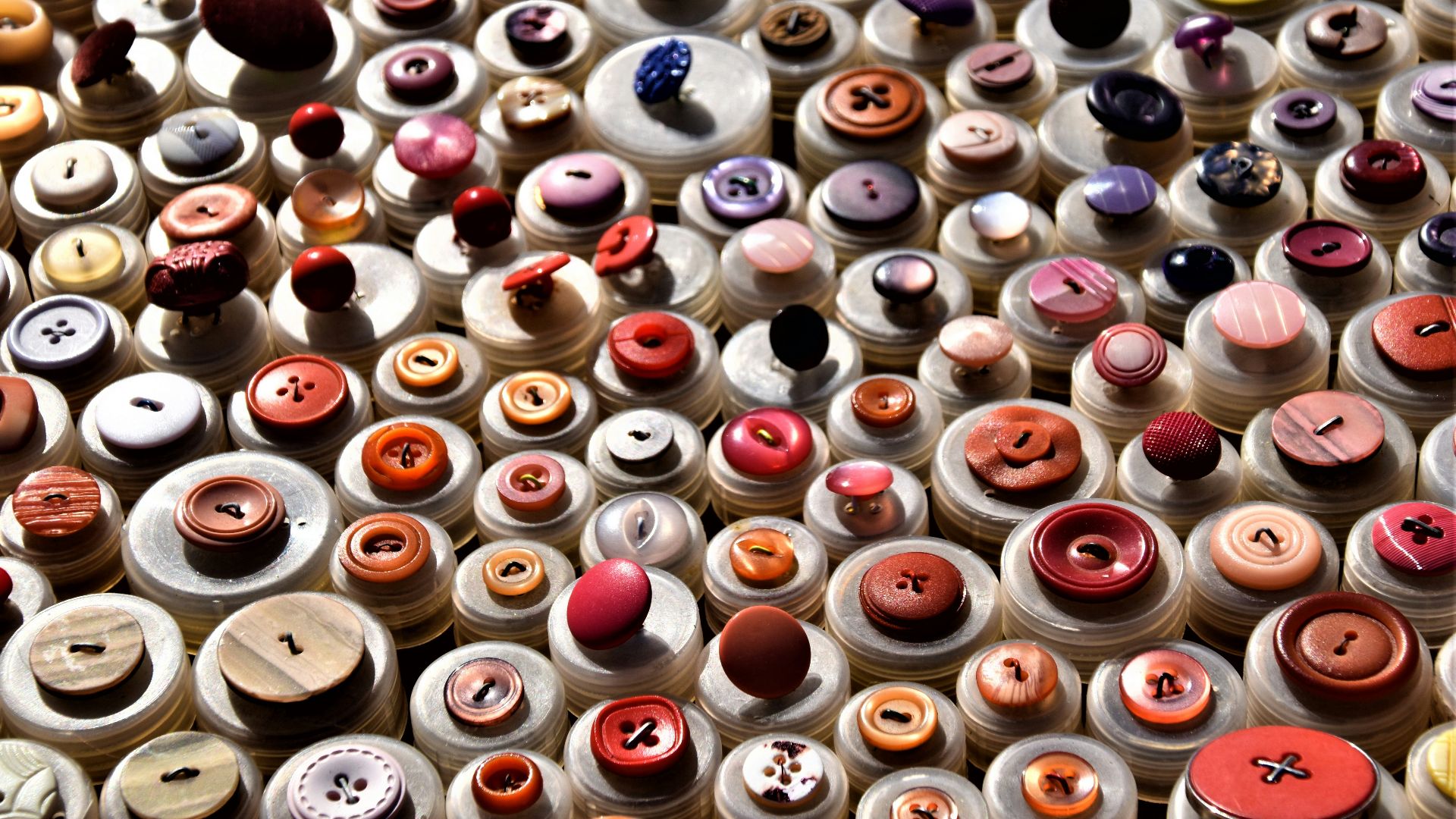 assorted-colored clothes buttons