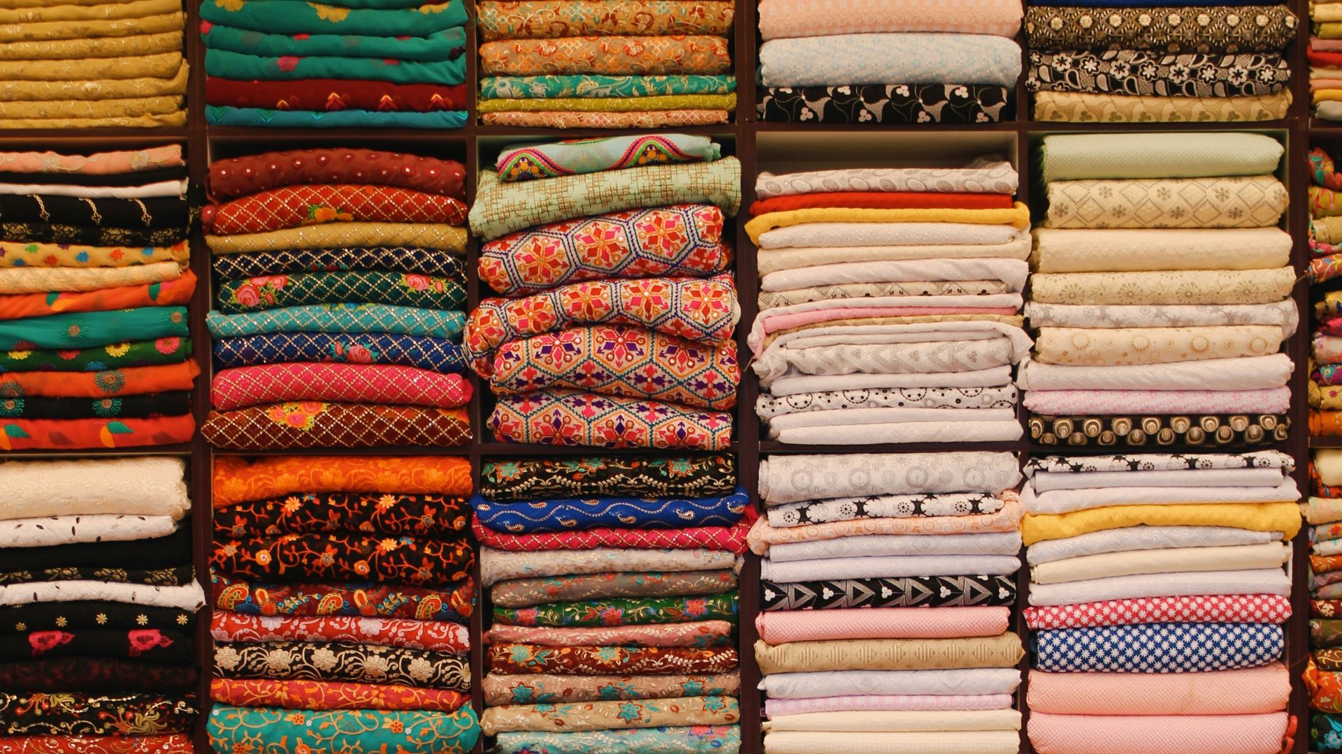 stack of books on red table