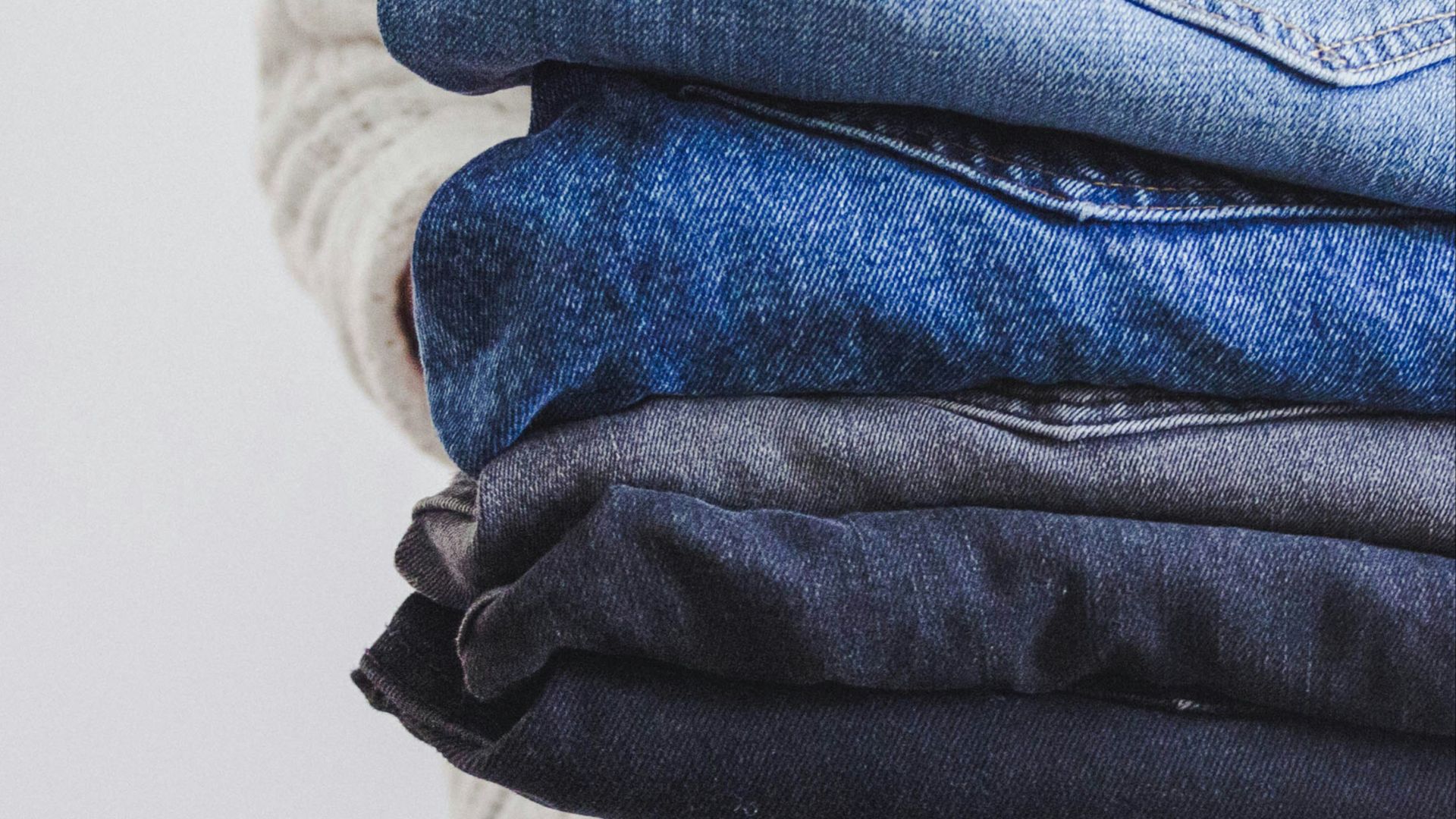 blue and white textile on white textile