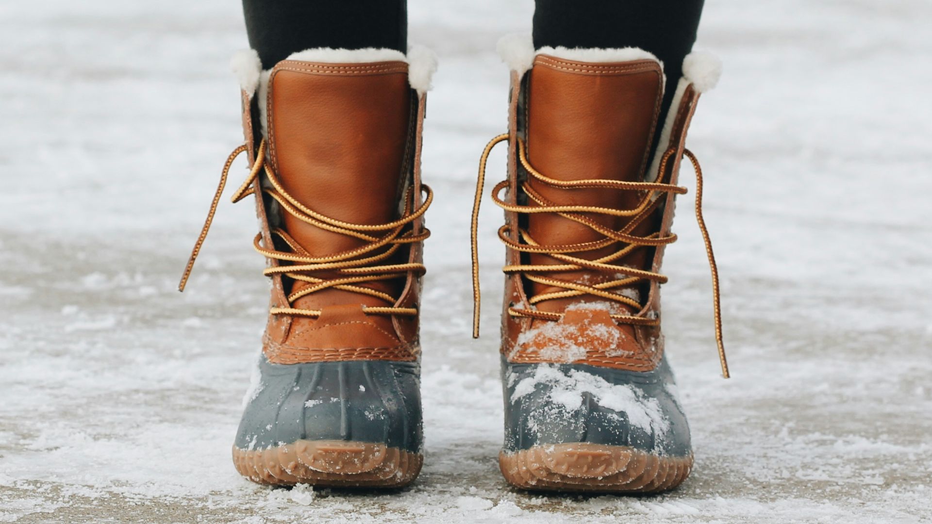 person standing on brown ground