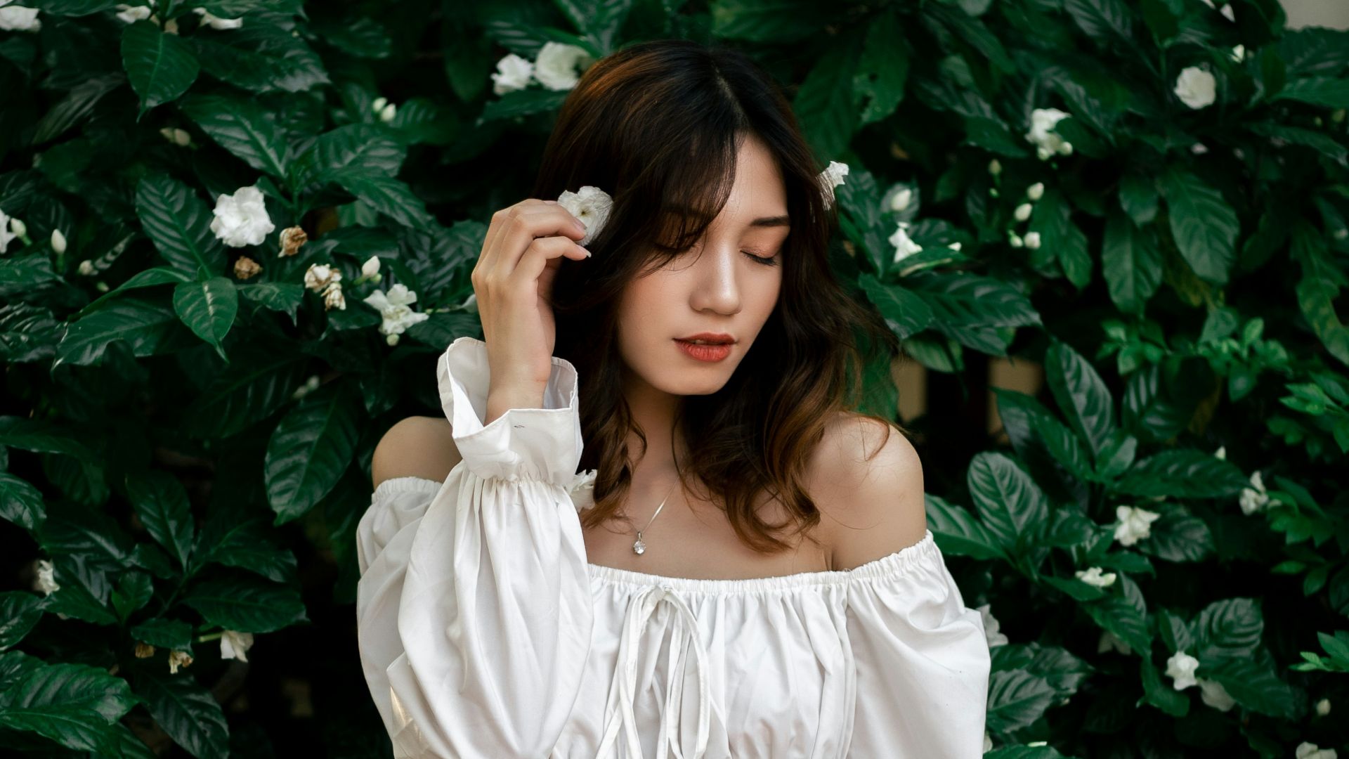 a woman in a white dress