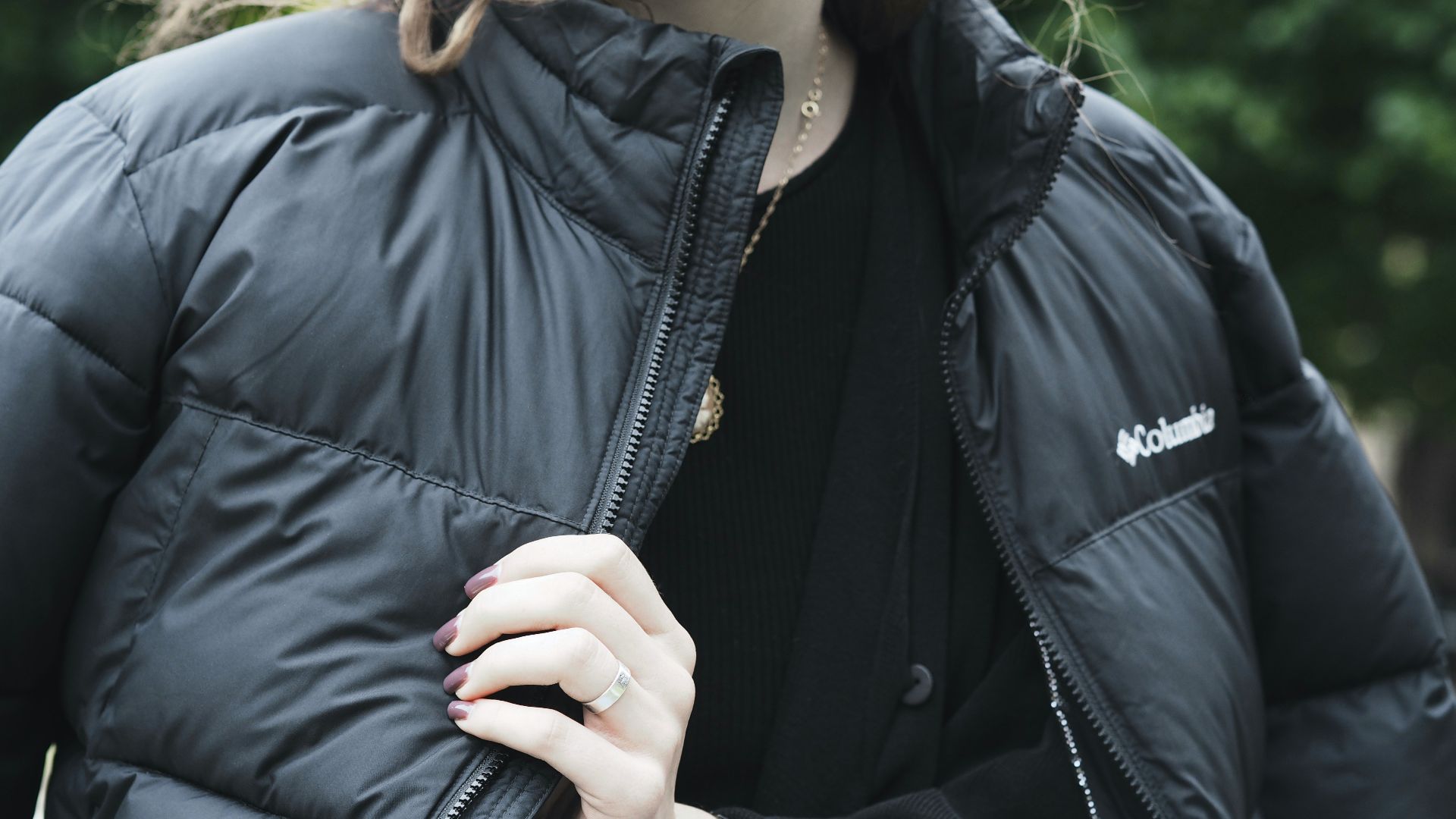 woman in black zip up jacket