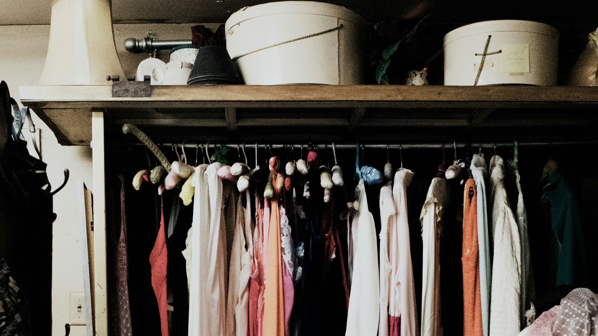 clothes hanged inside wardrobe