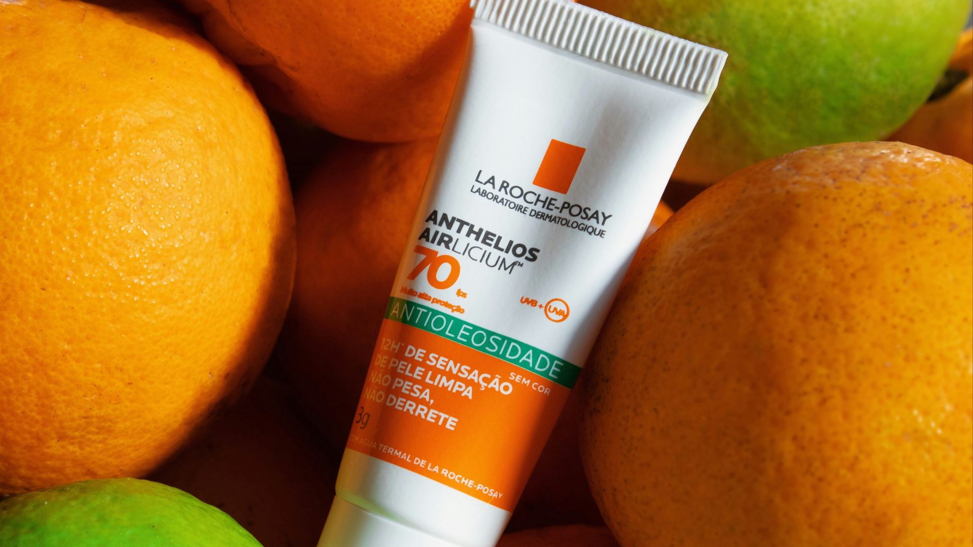 orange and white tube bottle