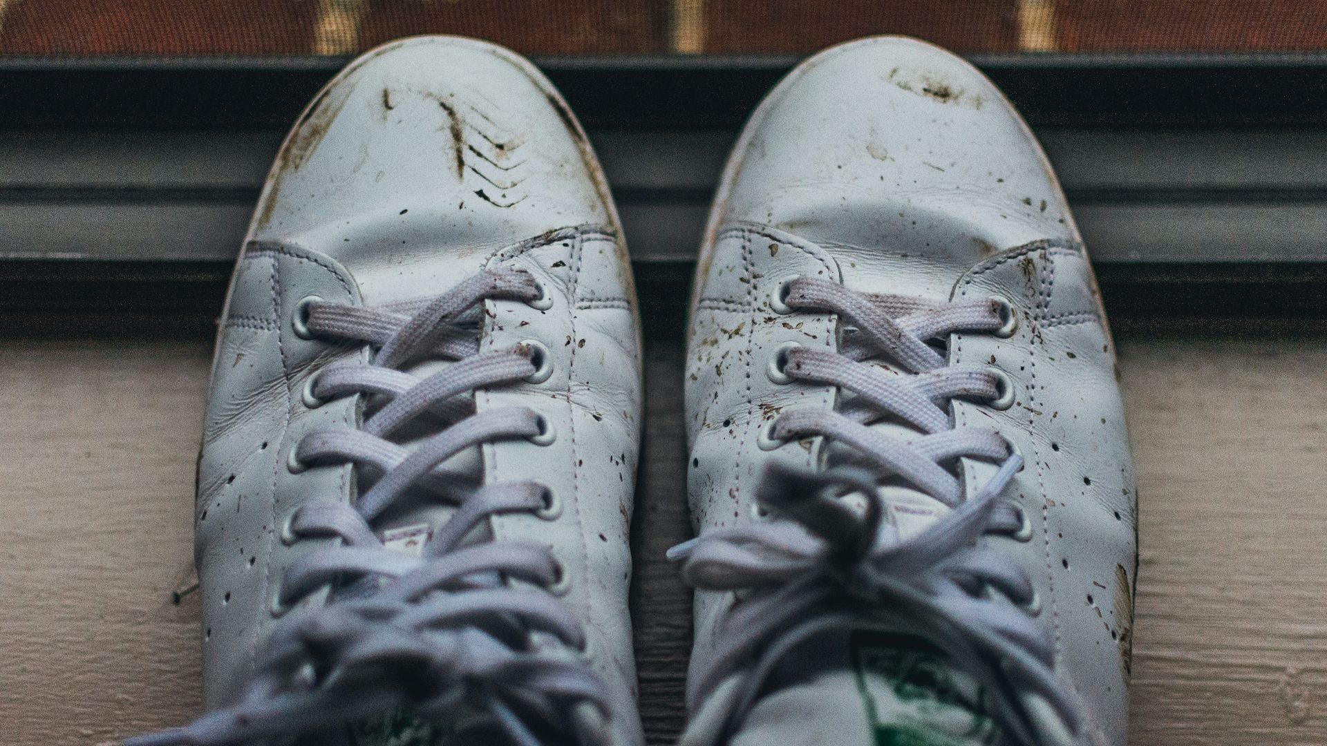 gray and white nike athletic shoes