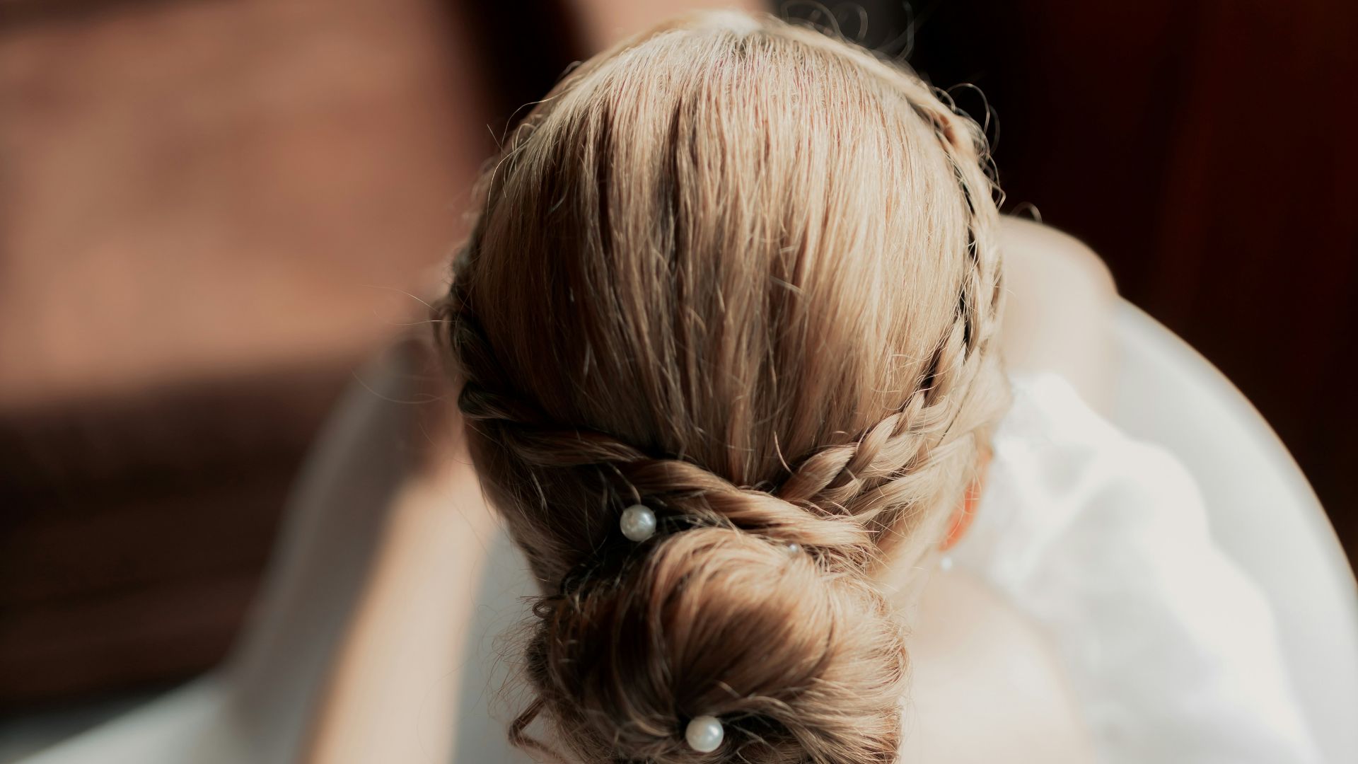 A bride's hair styled in an elegant updo.