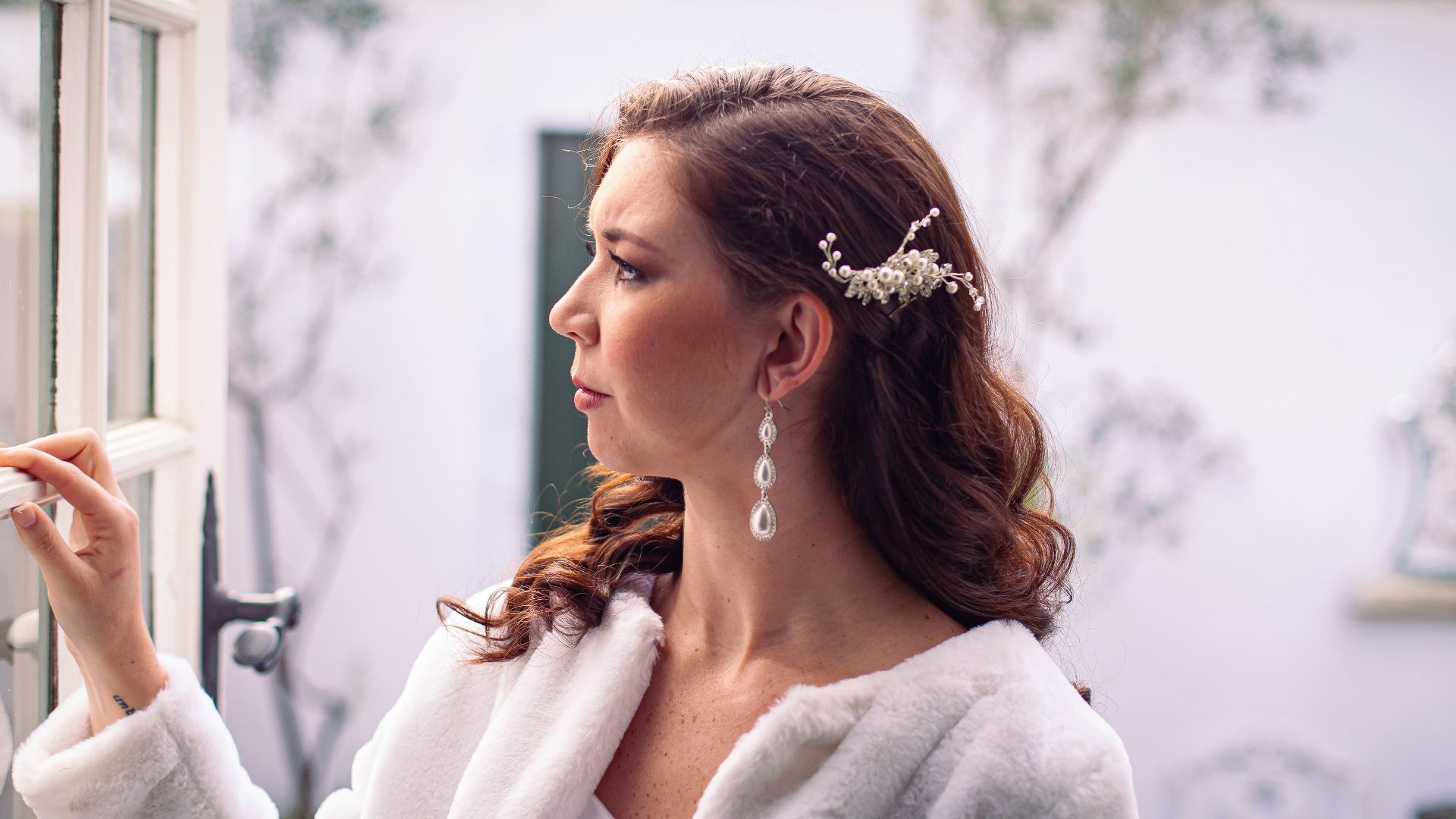 a woman with a flower in her hair