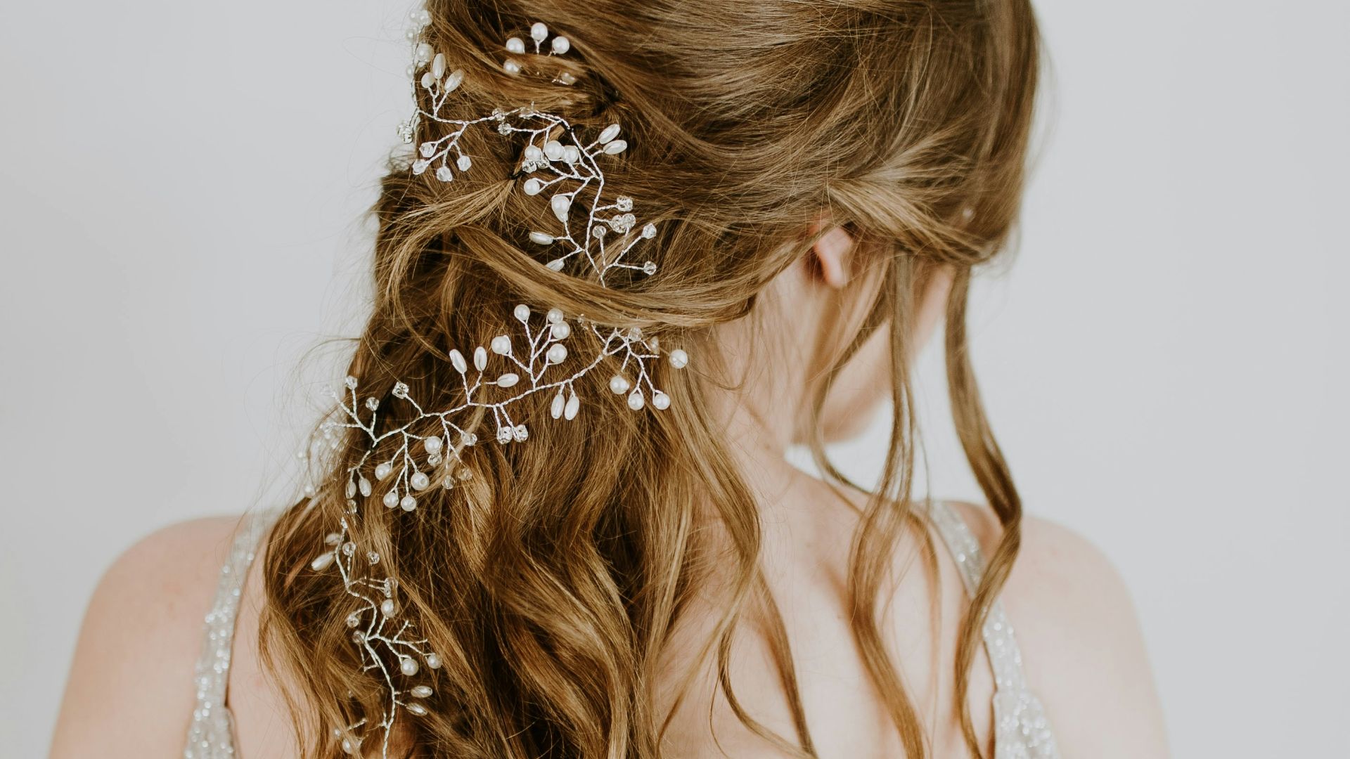 woman wearing white sleeveless dress