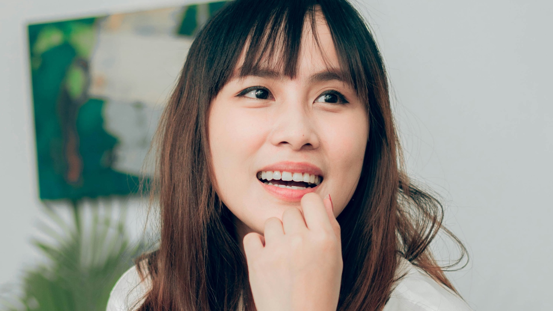 woman in white long sleeve shirt