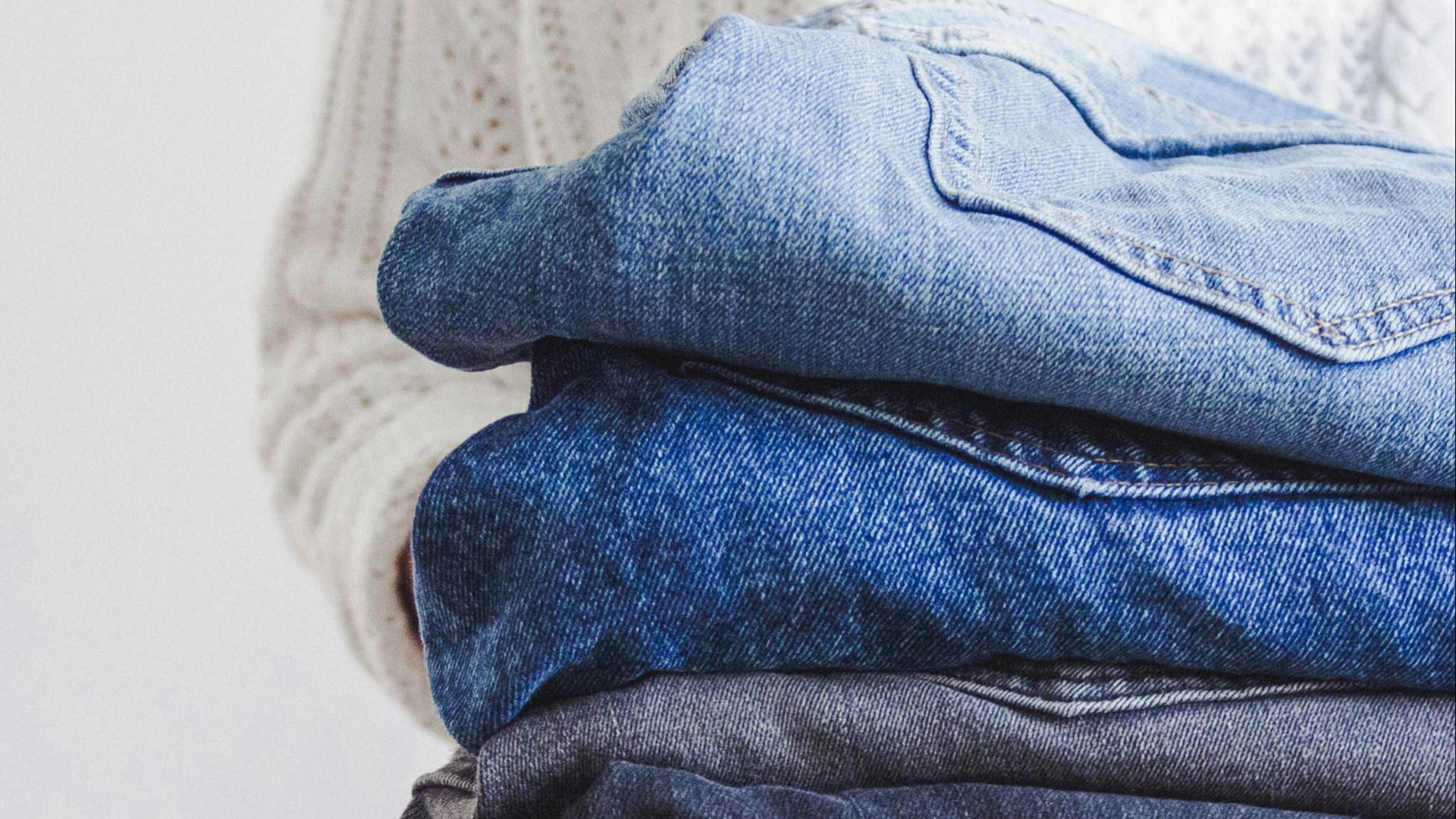 blue and white textile on white textile