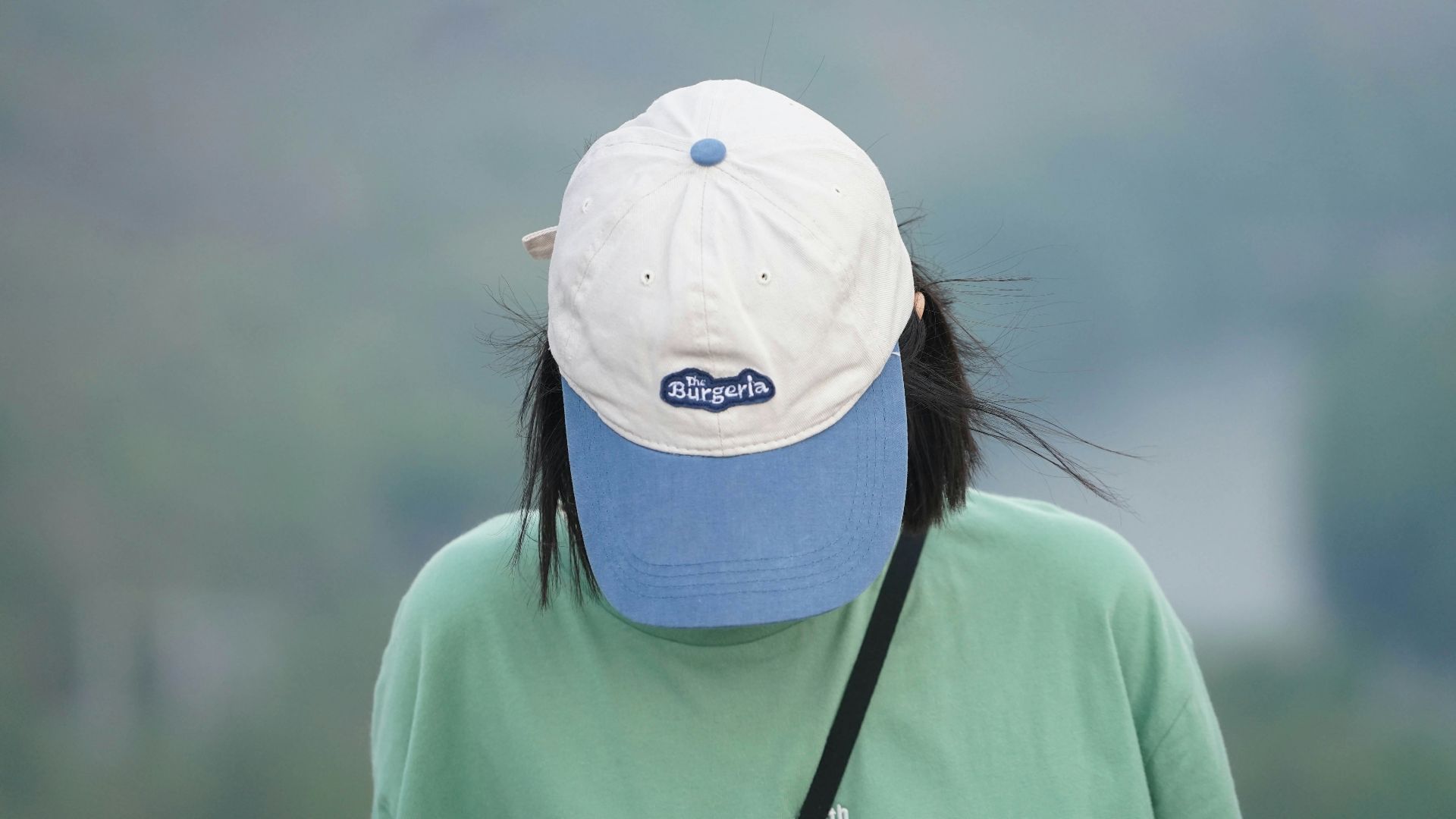 a person with a hat on their head