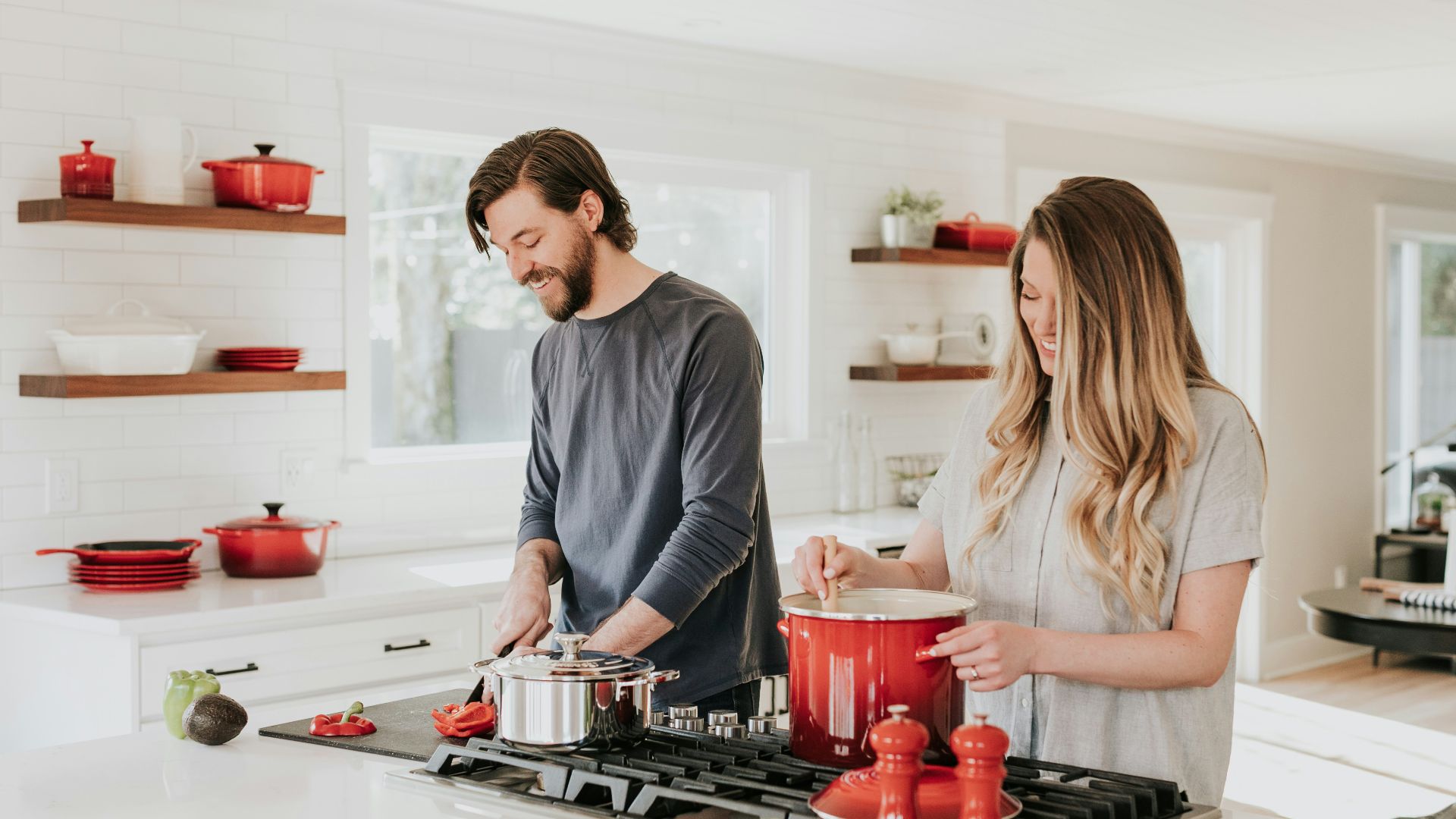 man and woman on kitchen