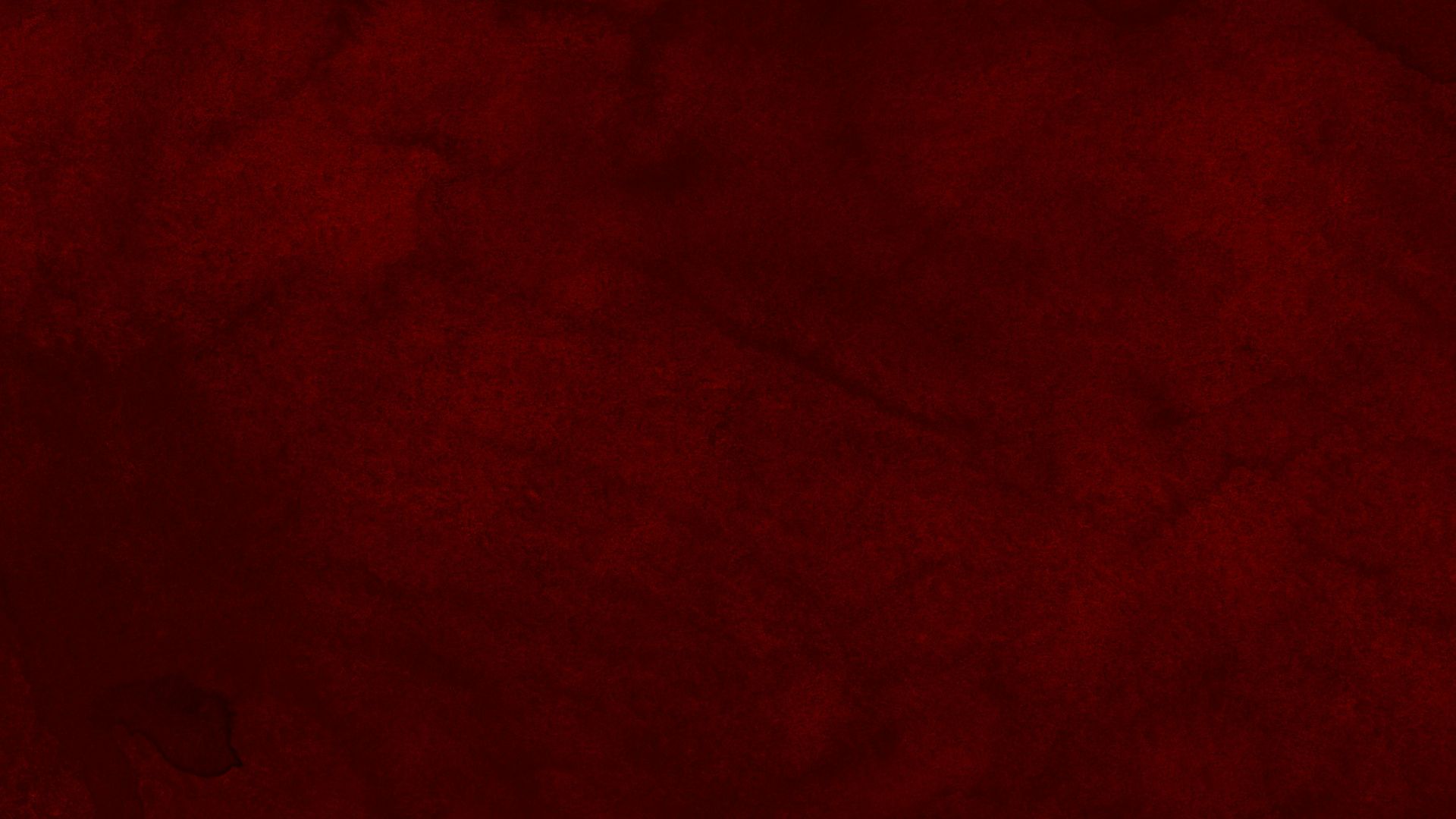 red textile on brown wooden table