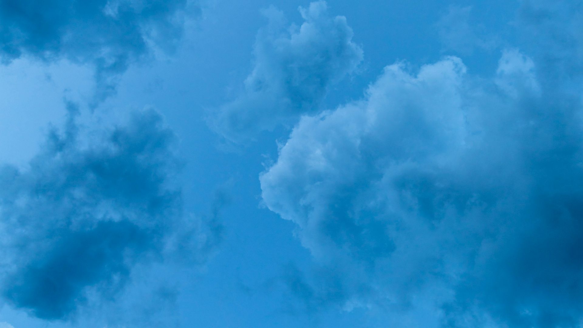 low angle view of blue clouds