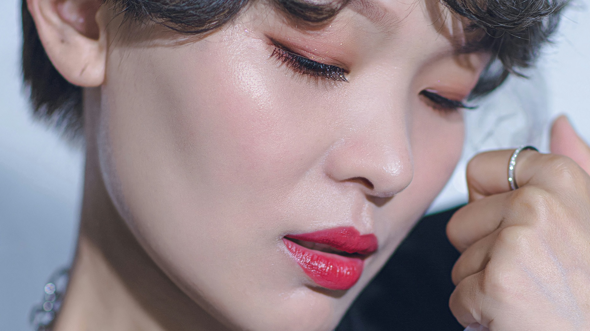 a woman with a ring on her finger