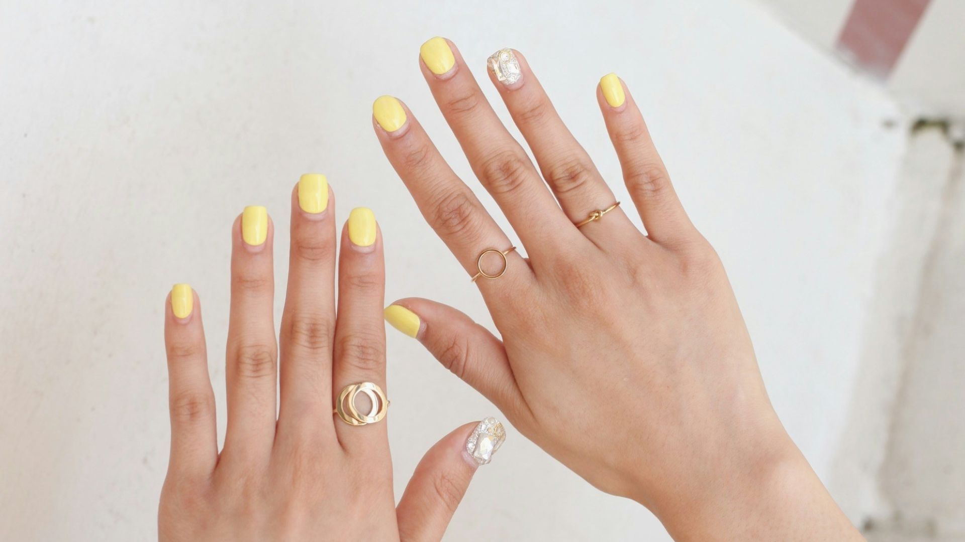 person wearing silver diamond ring