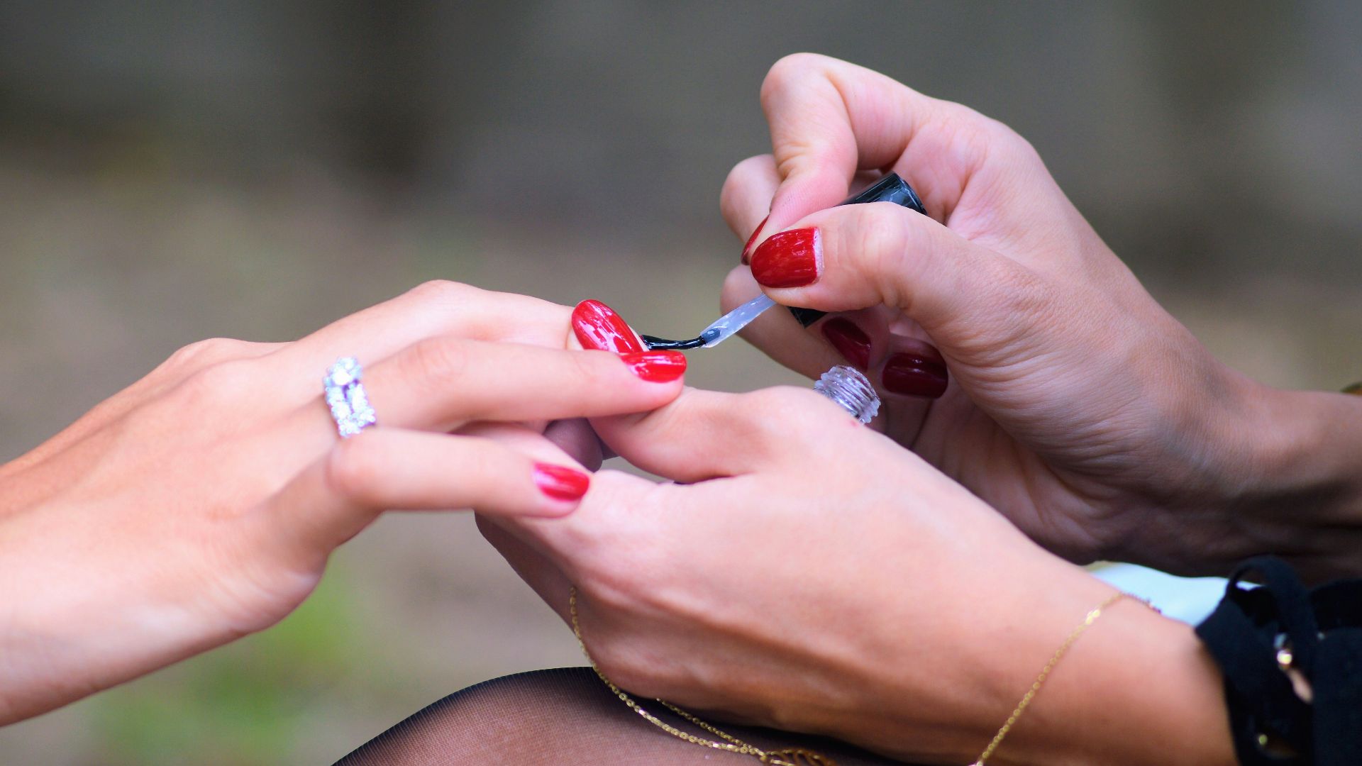 woman doing manicure