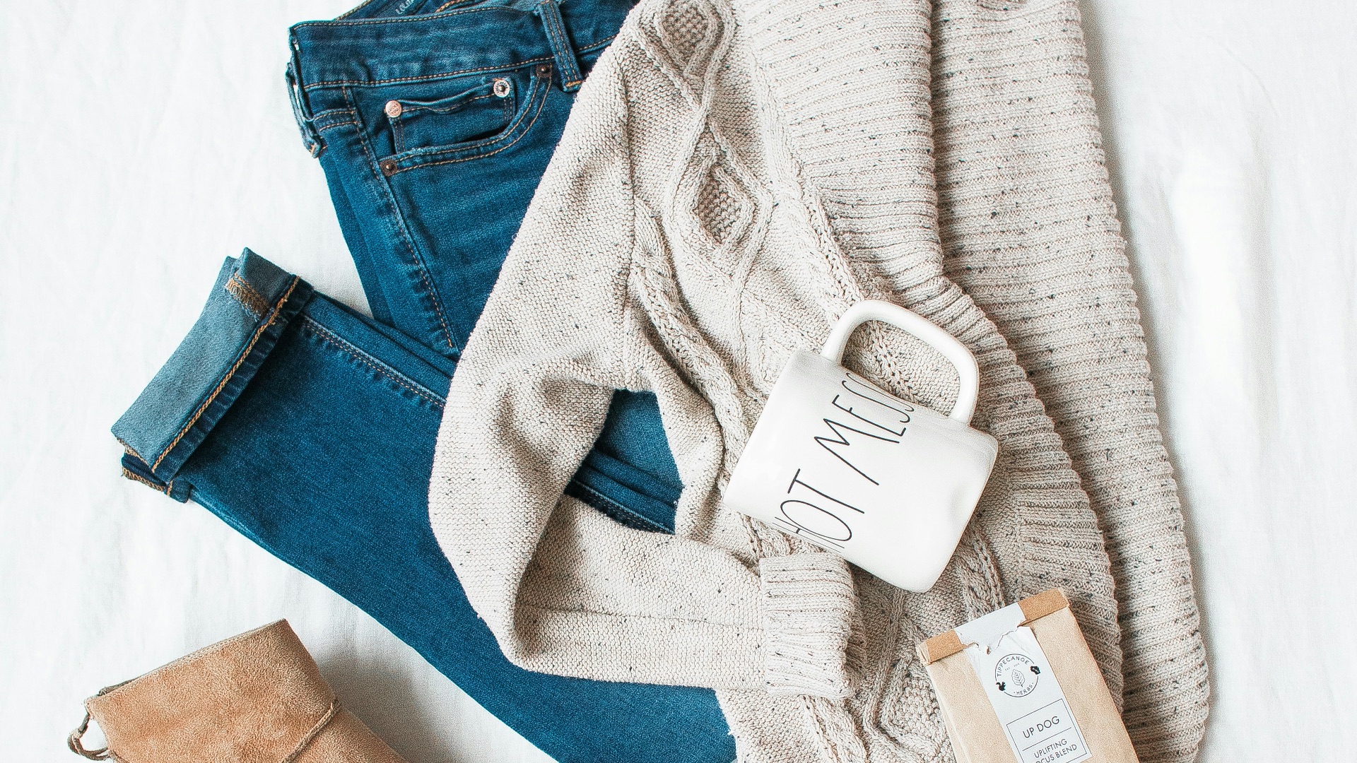 gray cardigan, blue jeans, and pair of brown chunky heeled shoes