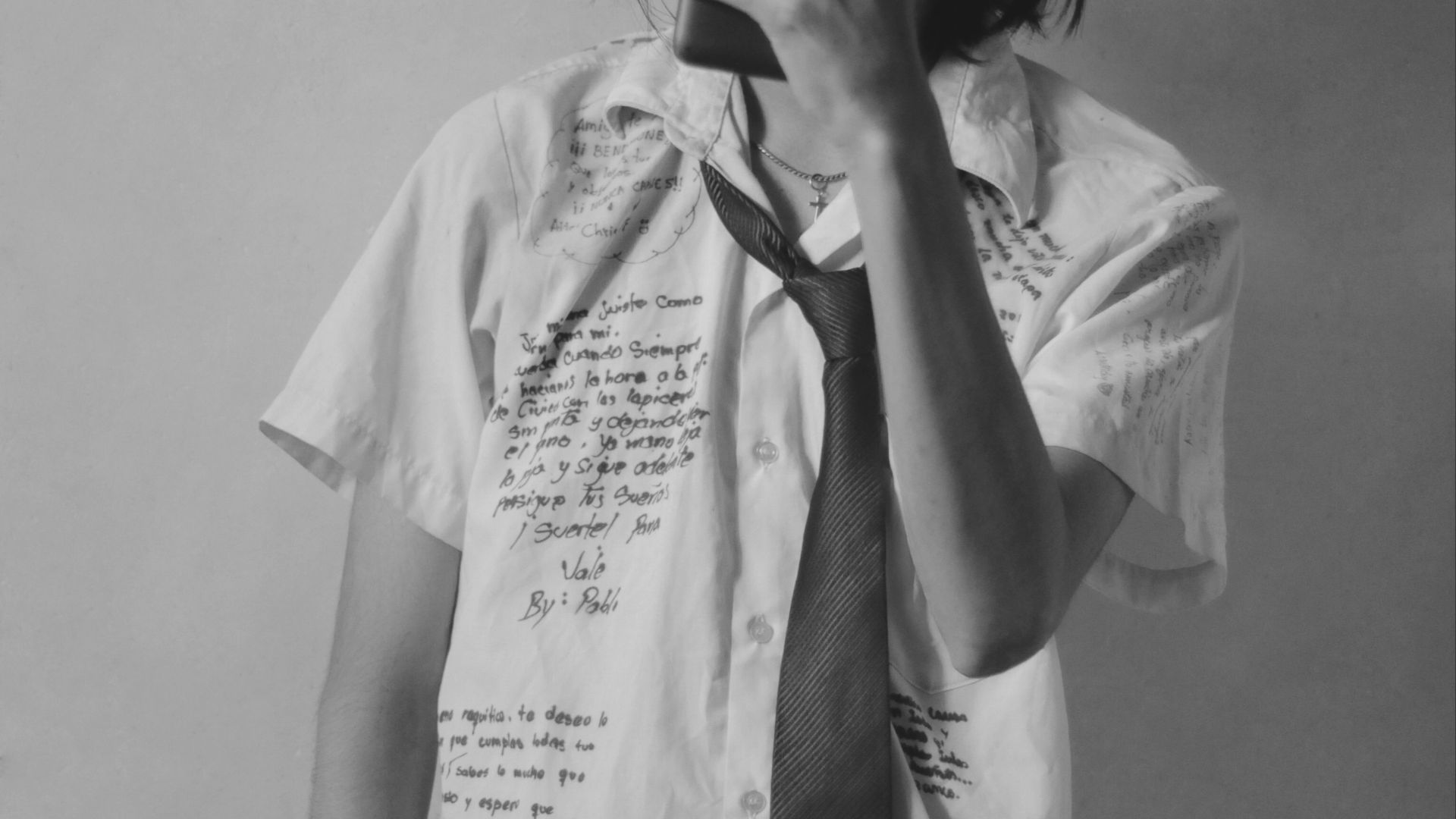 a woman is taking a selfie with her cell phone