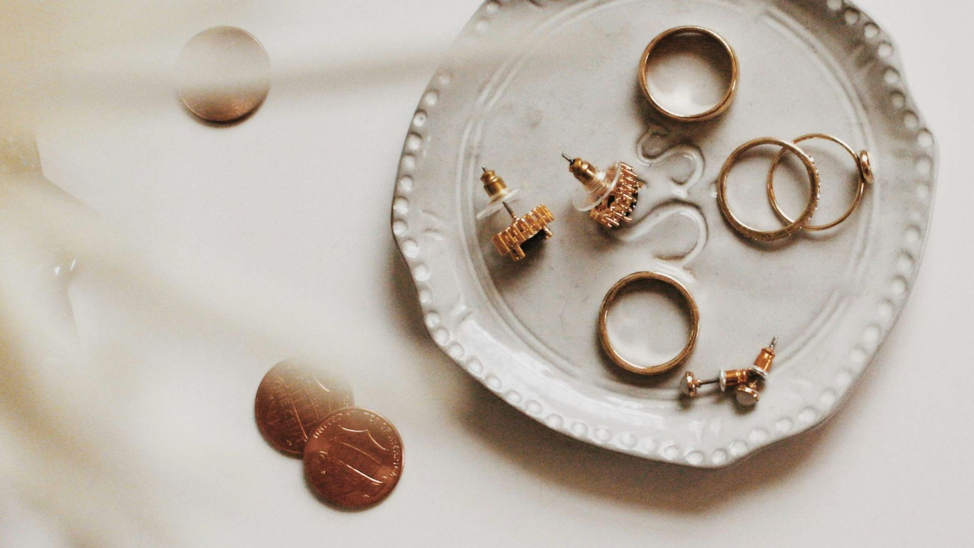 gold-colored jewelries