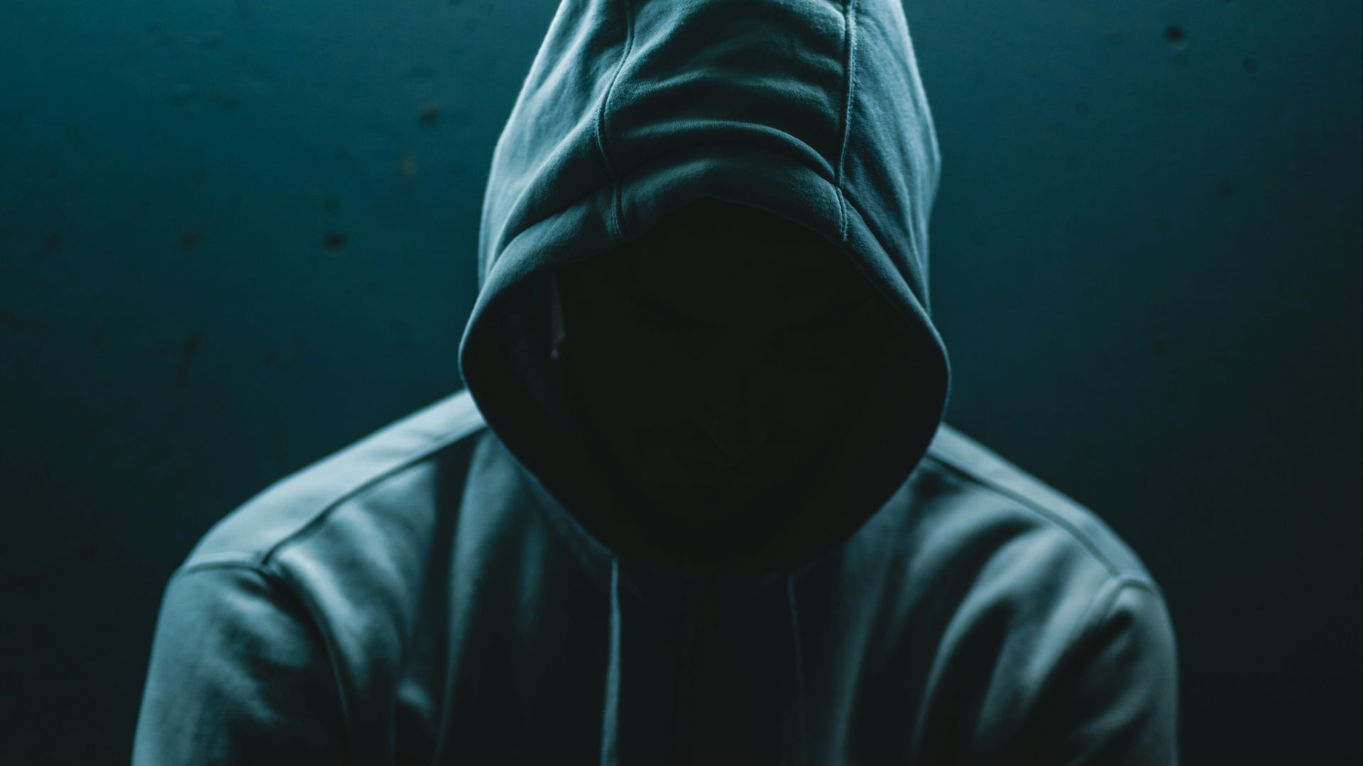 person in black hoodie jacket