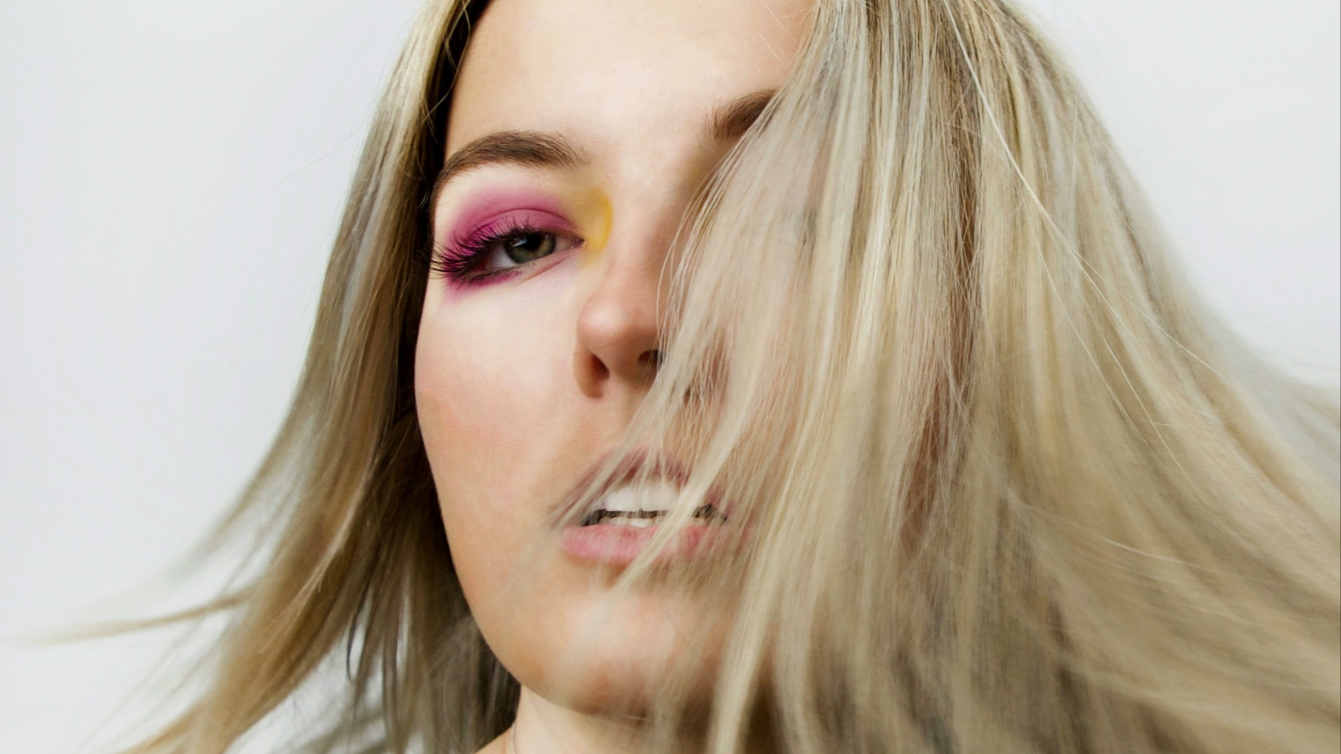 topless woman with blonde hair