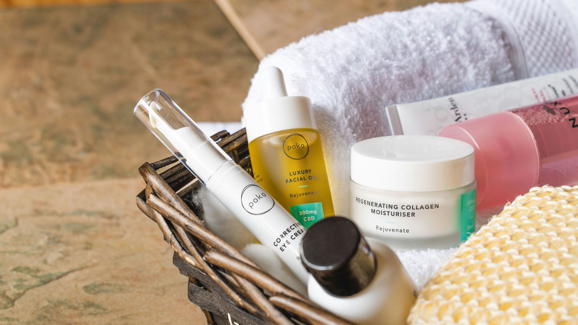 white and gold plastic bottles on brown wooden table