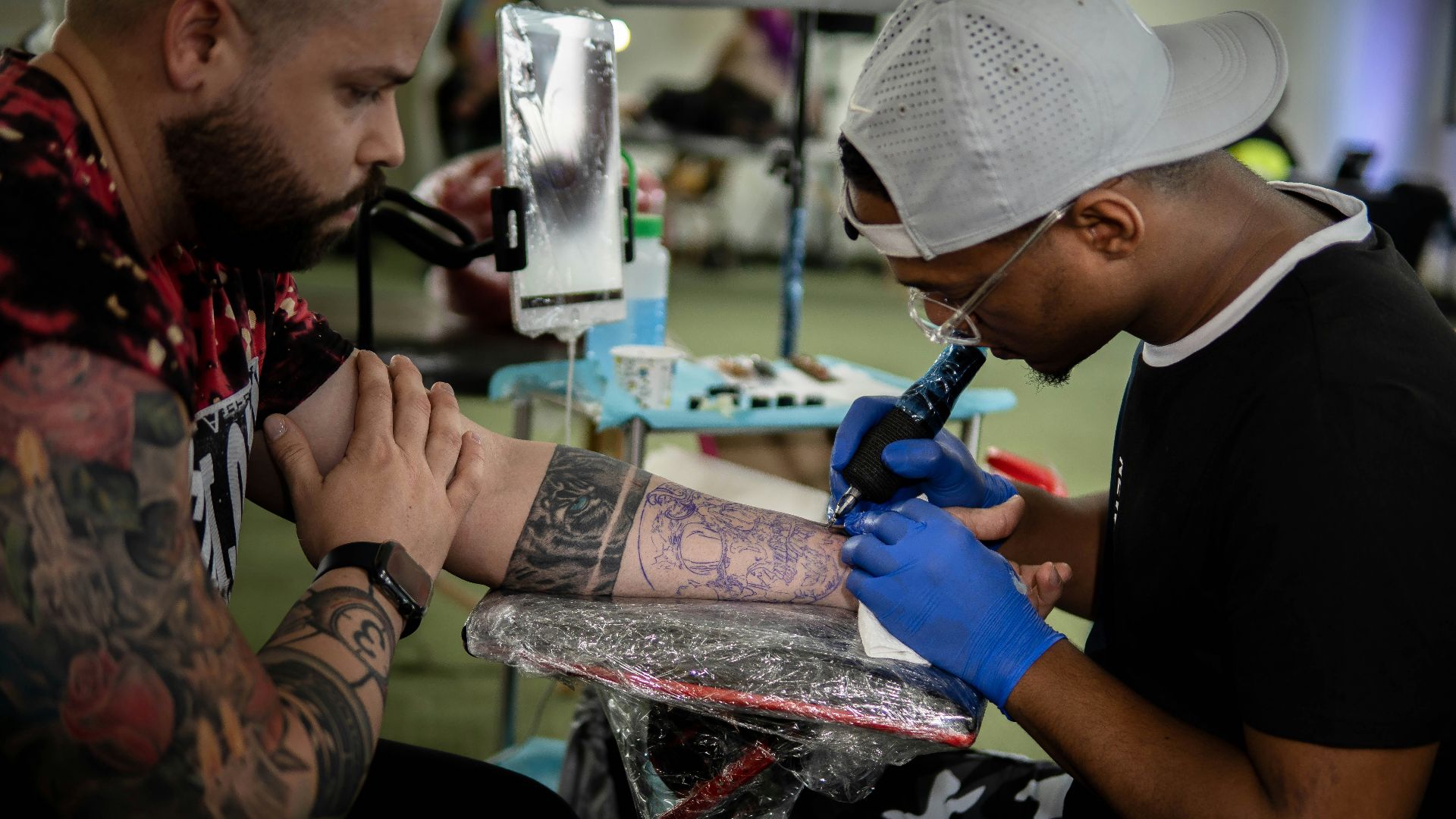a man getting a tattoo