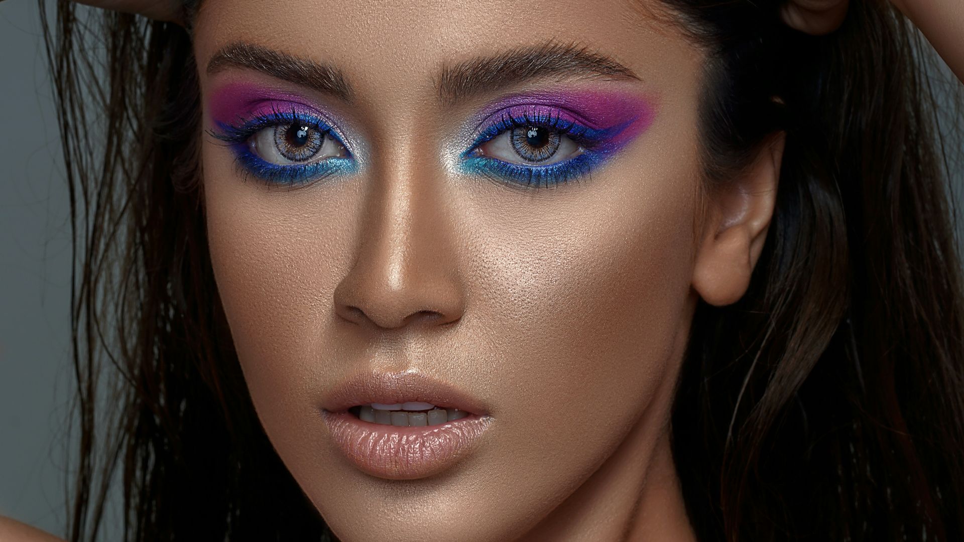 woman with blue eyes and black hair