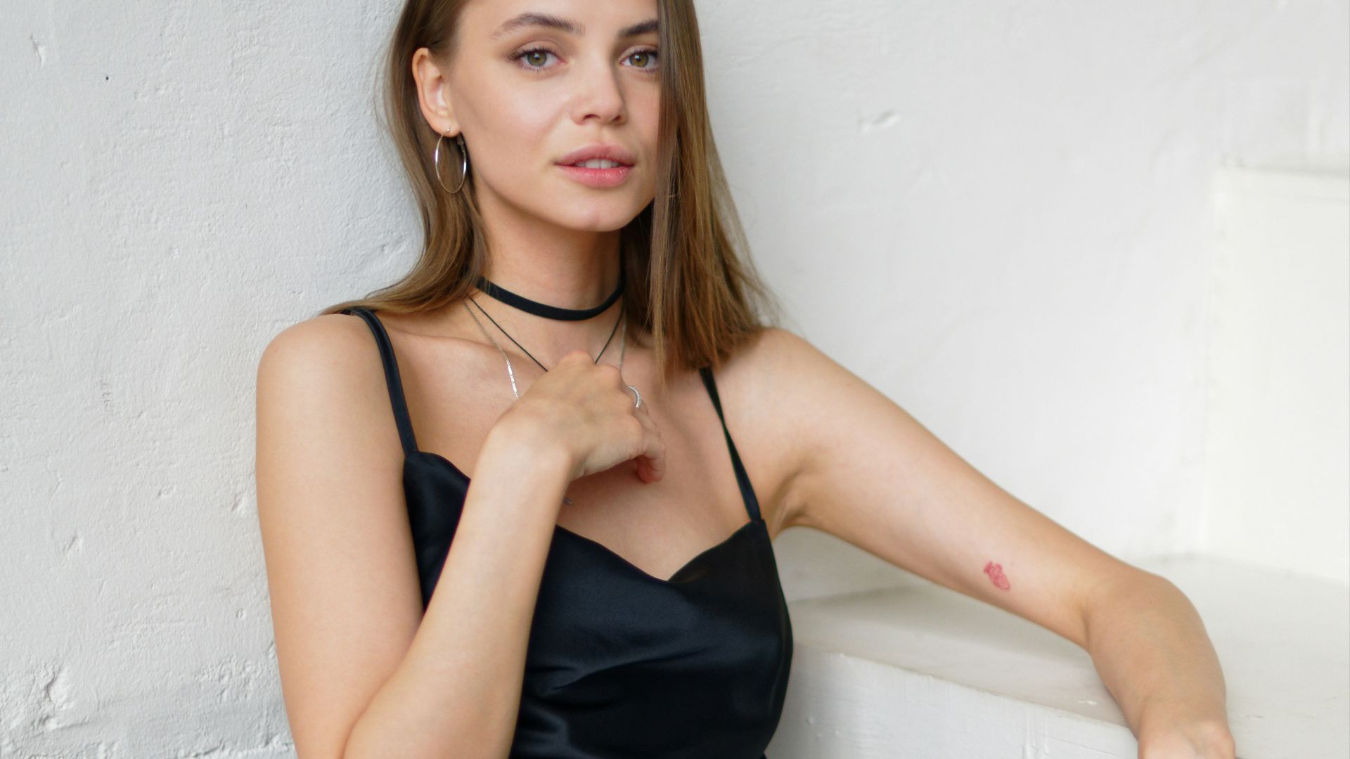 a woman in a black dress