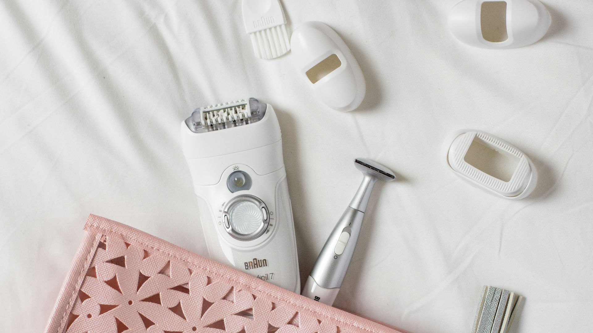 white shaver on white textile