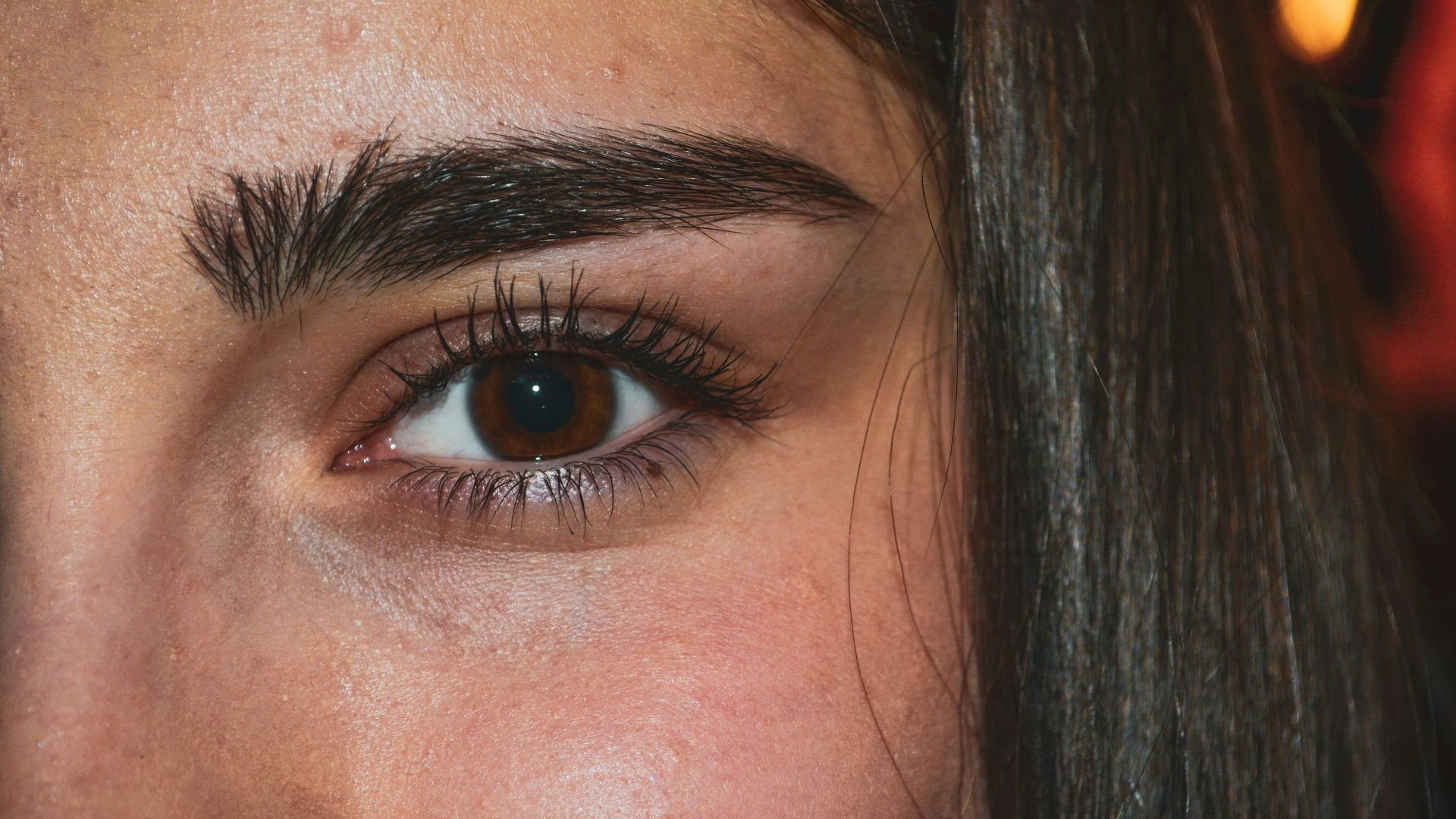 woman with black hair and blue eyes