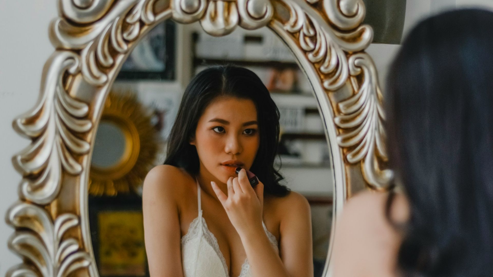 woman in white floral lace brassiere