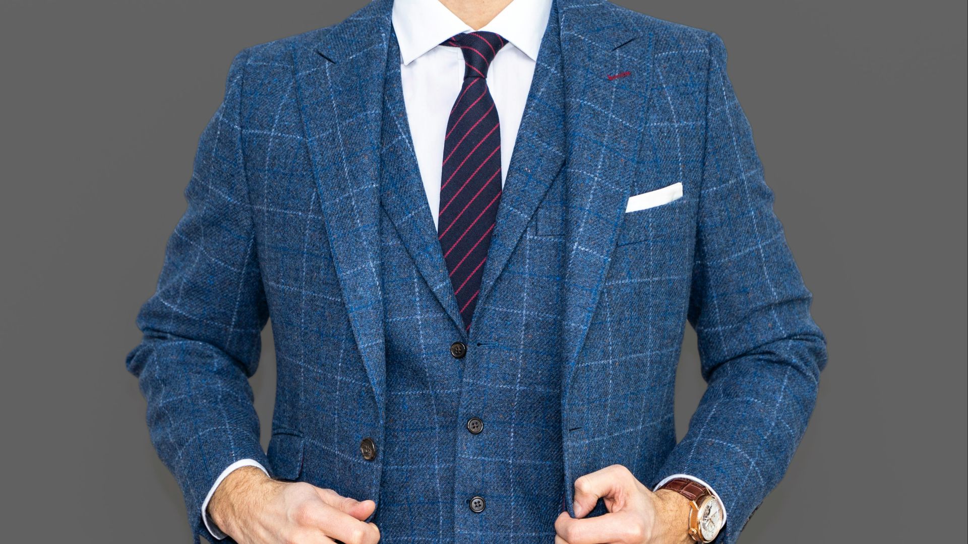 man in blue suit jacket