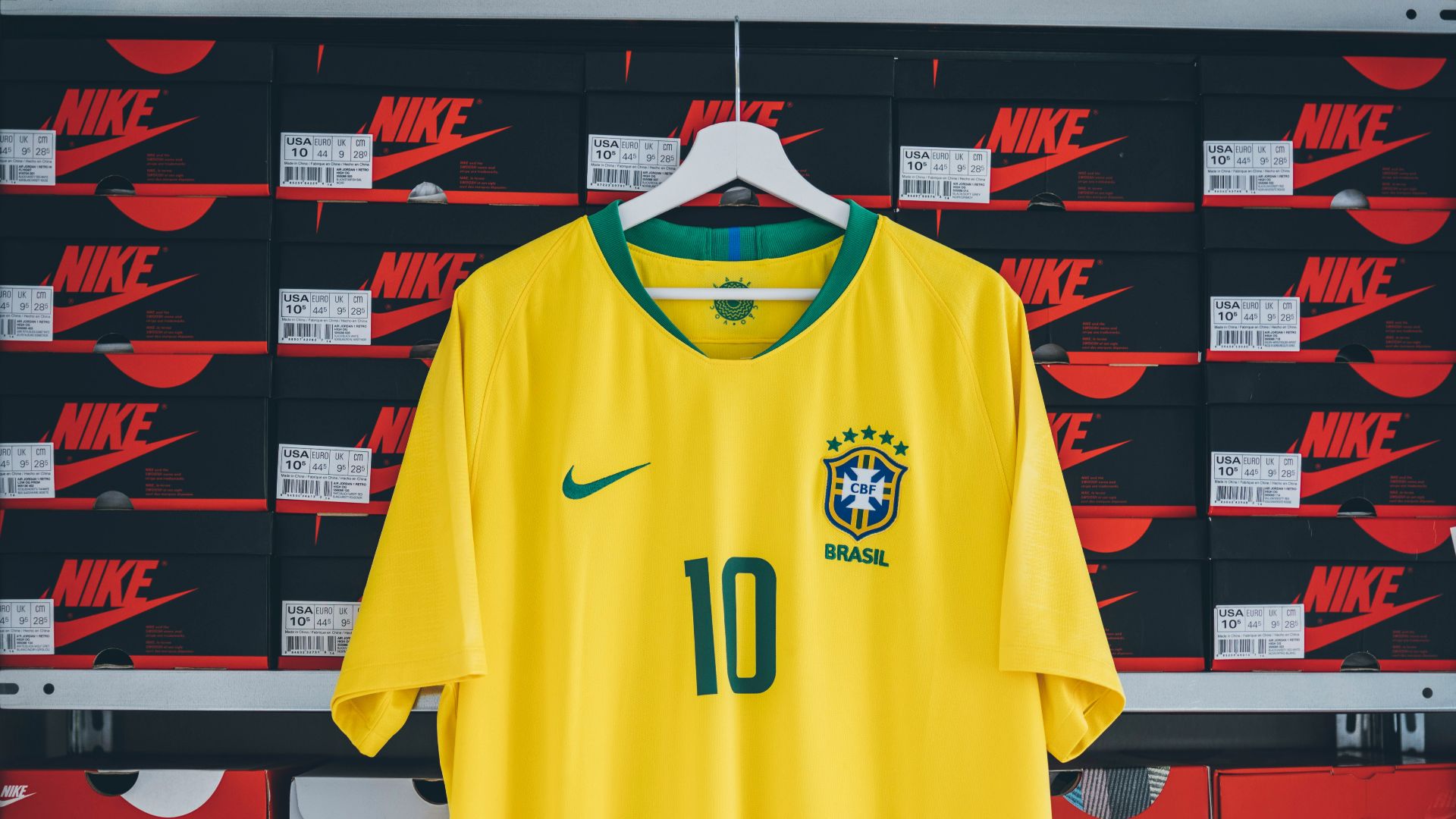 hanging yellow and green Nike soccer jersey shirt